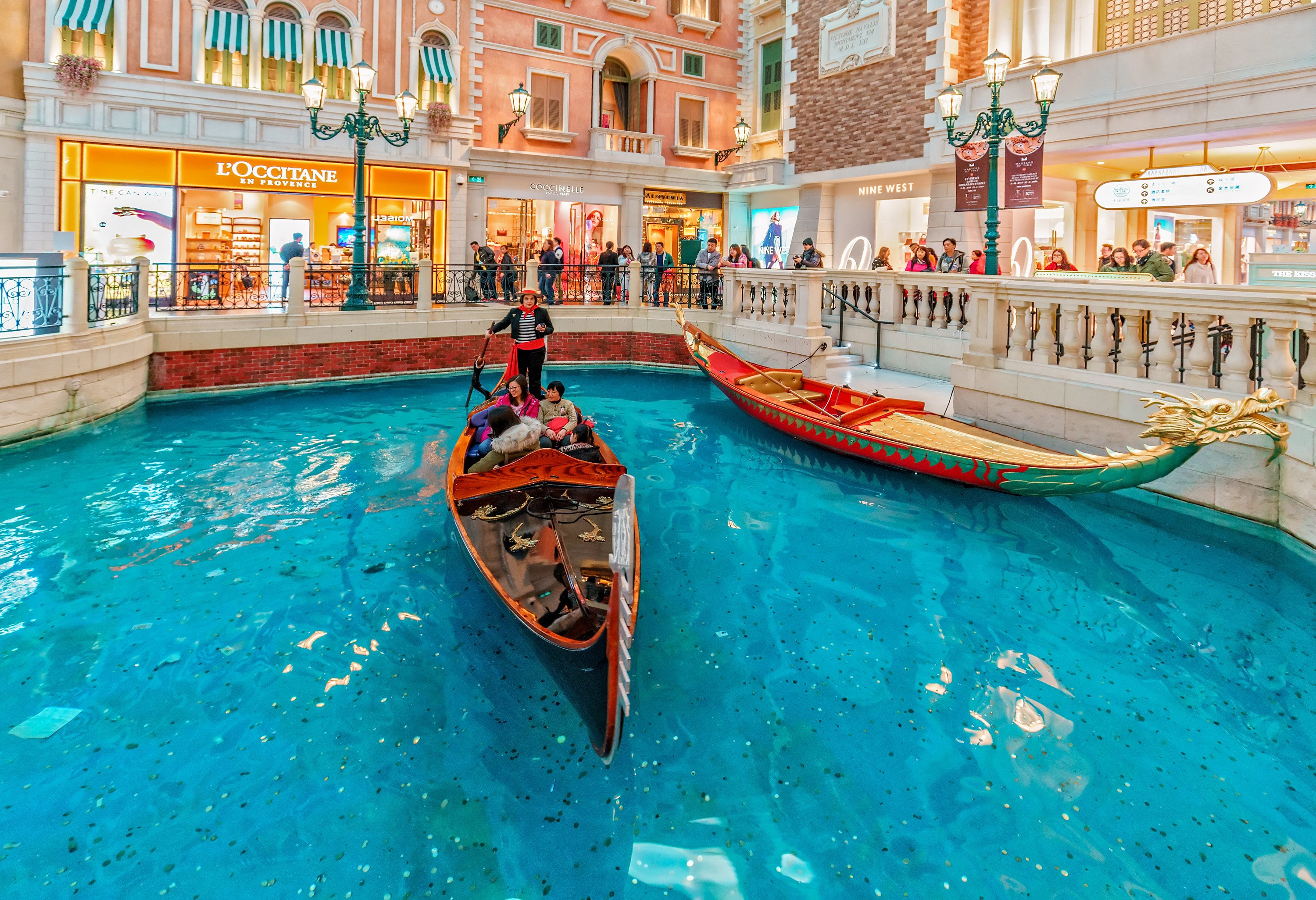 People take a ride at a mock Venetian canal at the Venetian Macau Resort Hotel. Photo: Shutterstock
