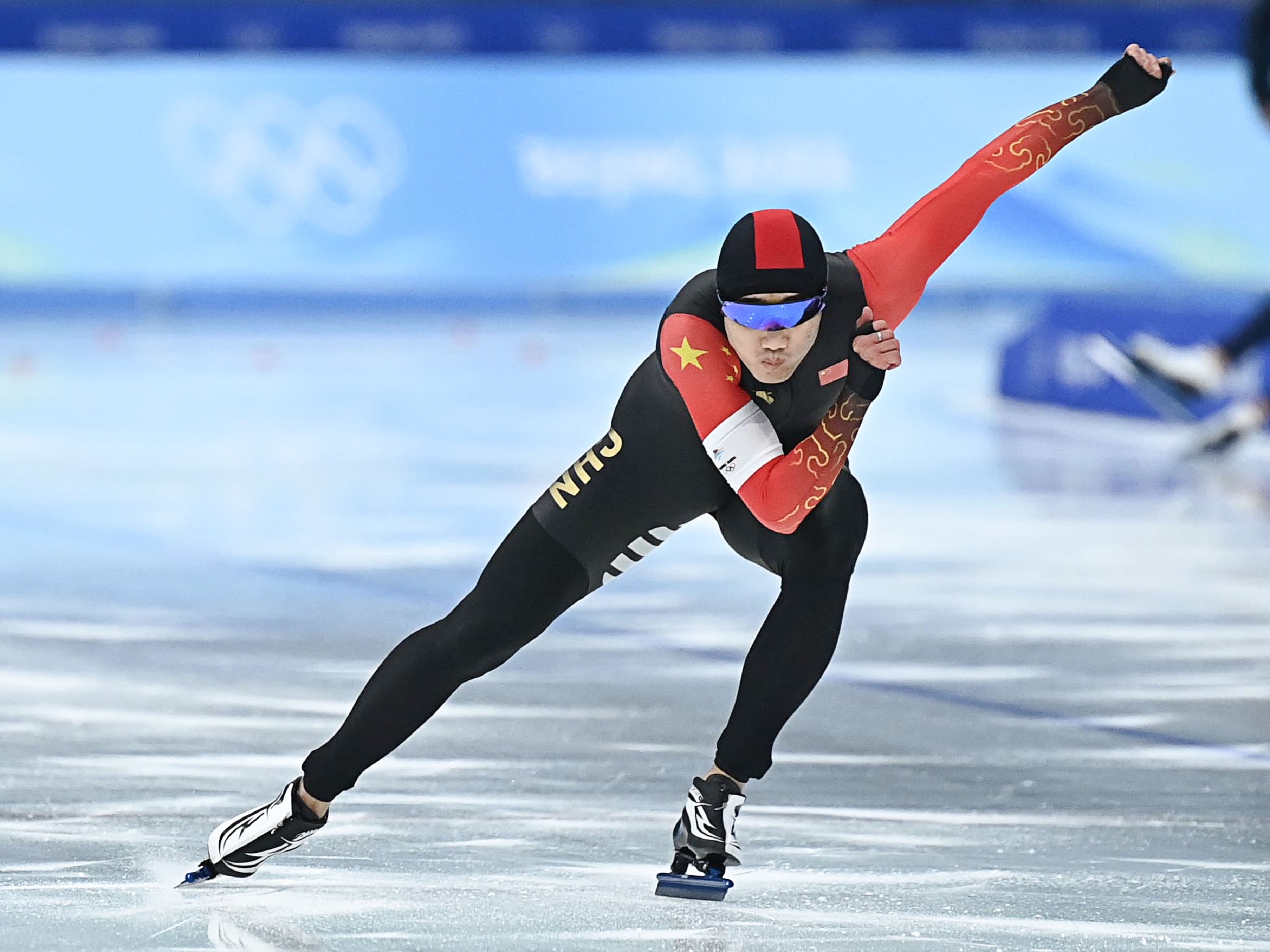 Gao Tingyu competes during the men’s 500m speedskating final. Photo: Xinhua