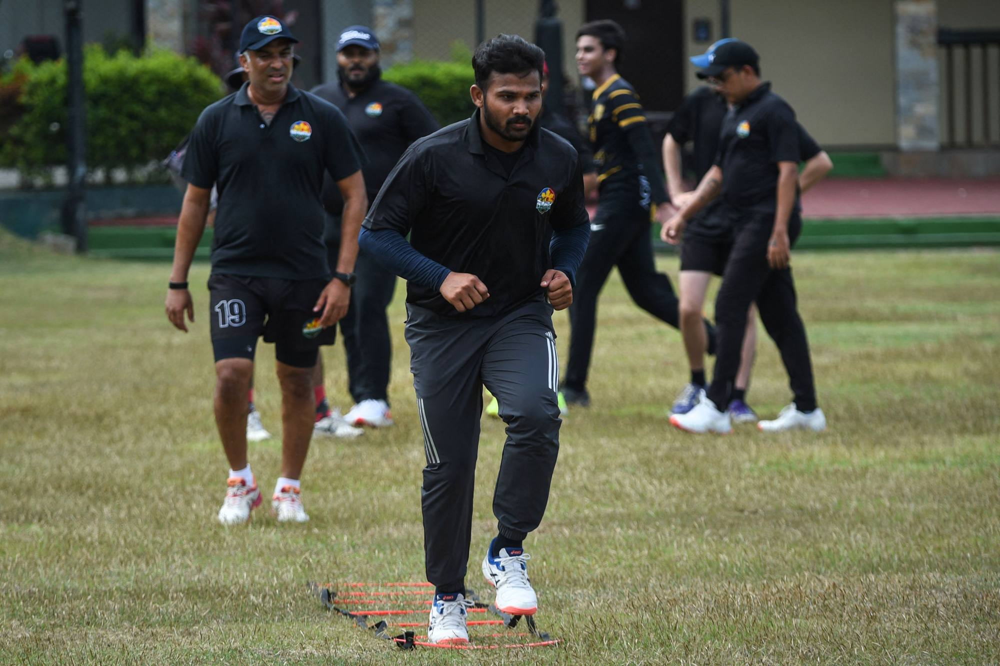 Philippines cricket players train at the United Club pitch in Paranque City in suburban Manila. Photo: AFP