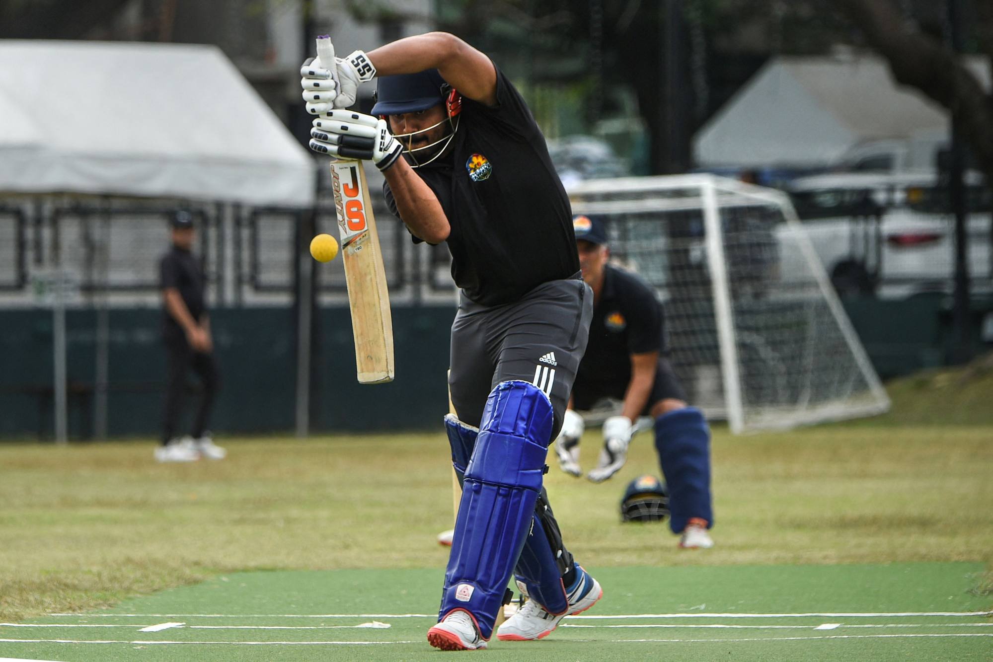 Sivamohanreddy Busireddy plays a defensive shot during a training session for the Philippines cricket team. Photo: AFP