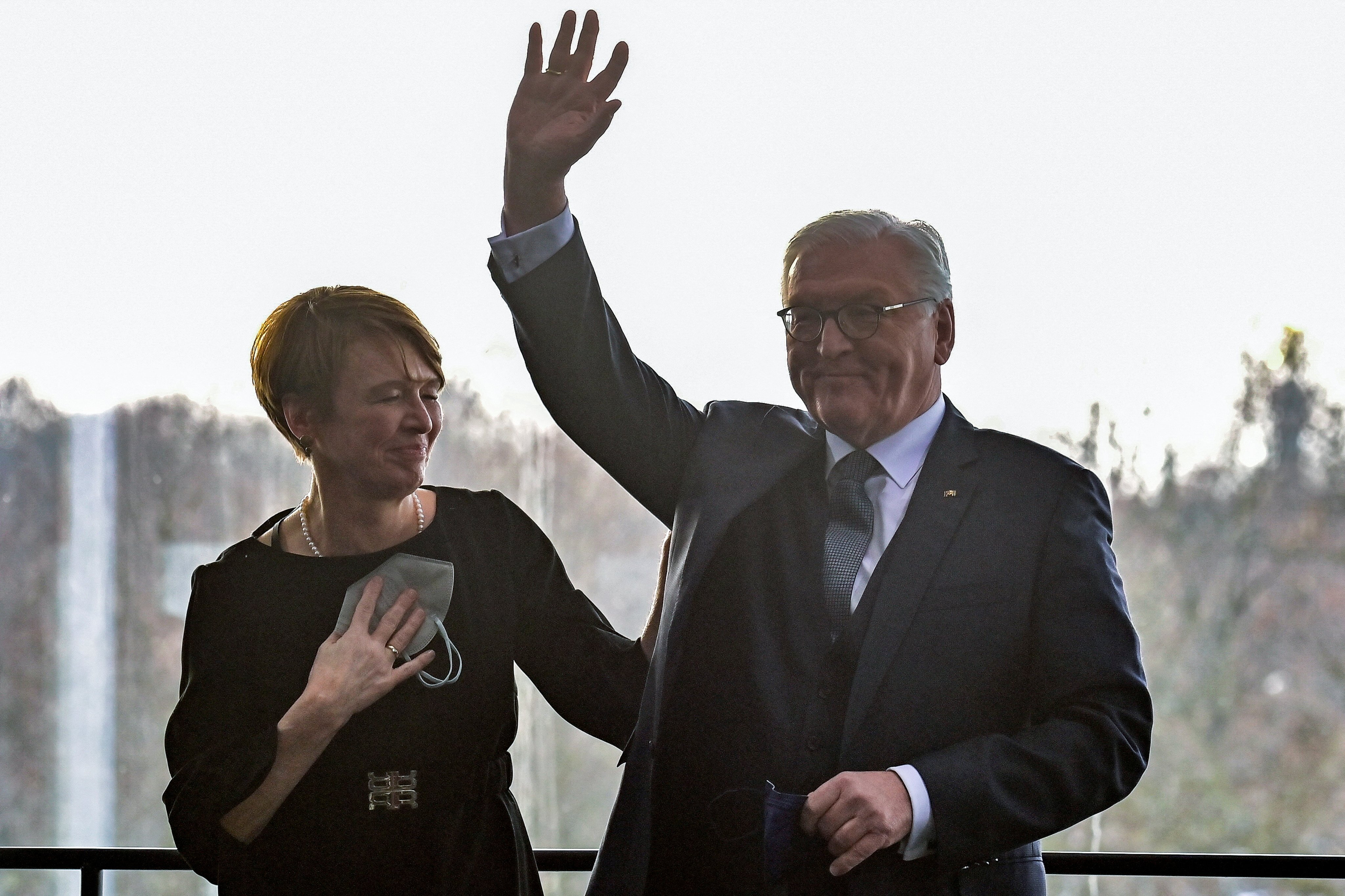 German President Frank-Walter Steinmeier waves next to his wife Elke Buedenbender after his re-election as Germany’s President in Berlin, Germany on February 13. Photo: Pool via Reuters