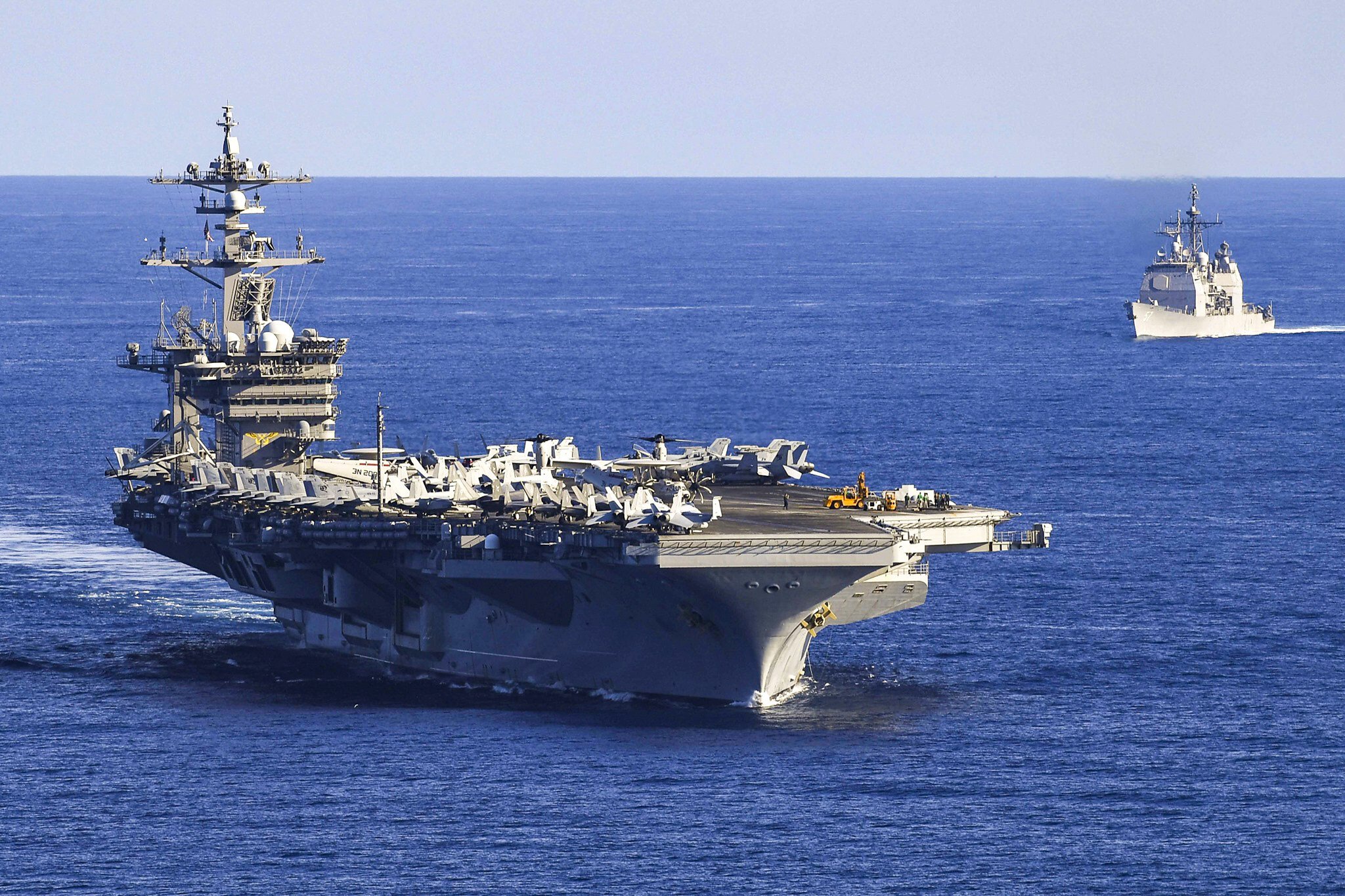 The aircraft carrier USS Carl Vinson and guided-missile cruiser USS Lake Champlain transit the South China Sea on November 4. Photo: Handout