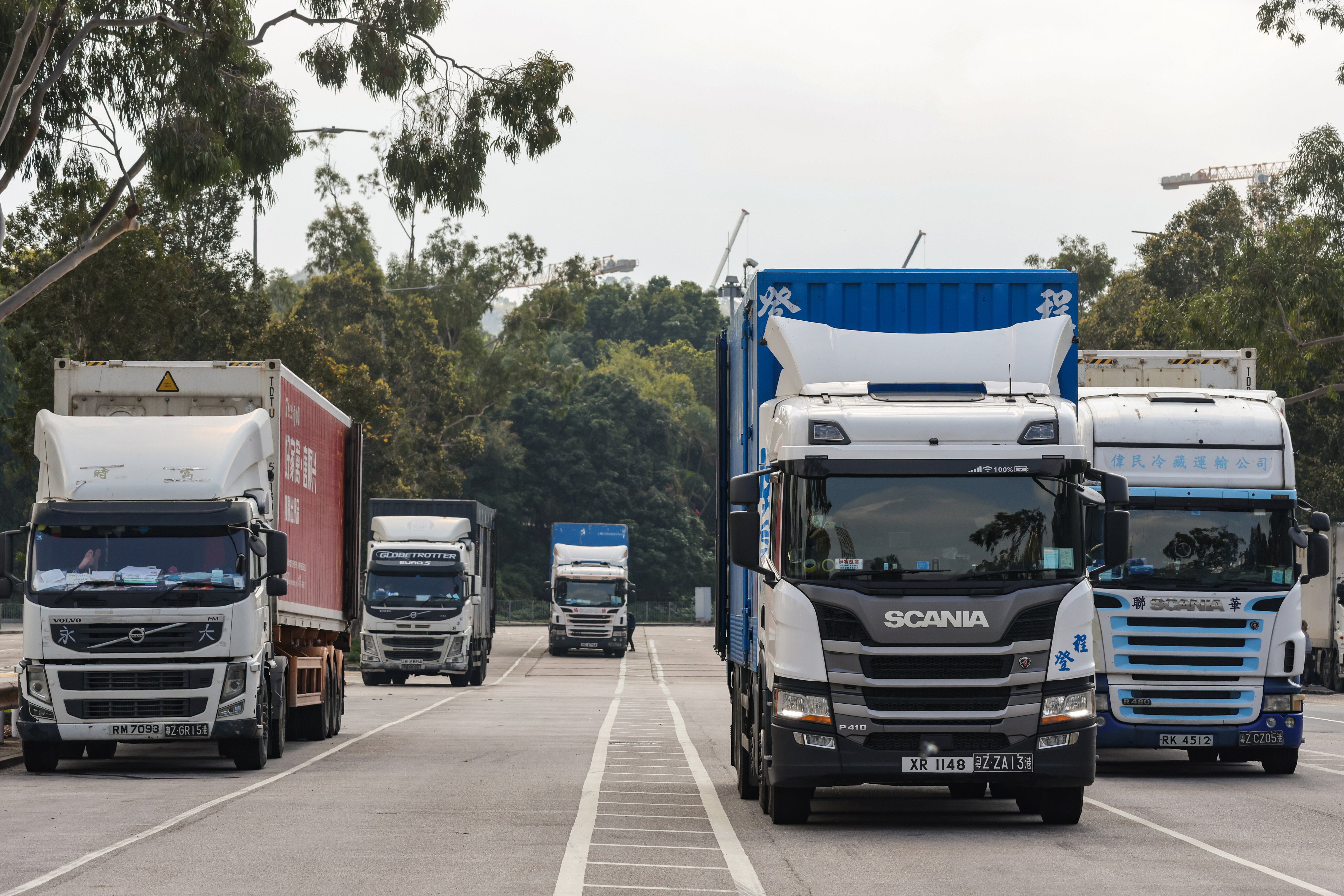 Cross-border trucks at Man Kam To Control Point. Photo: May Tse