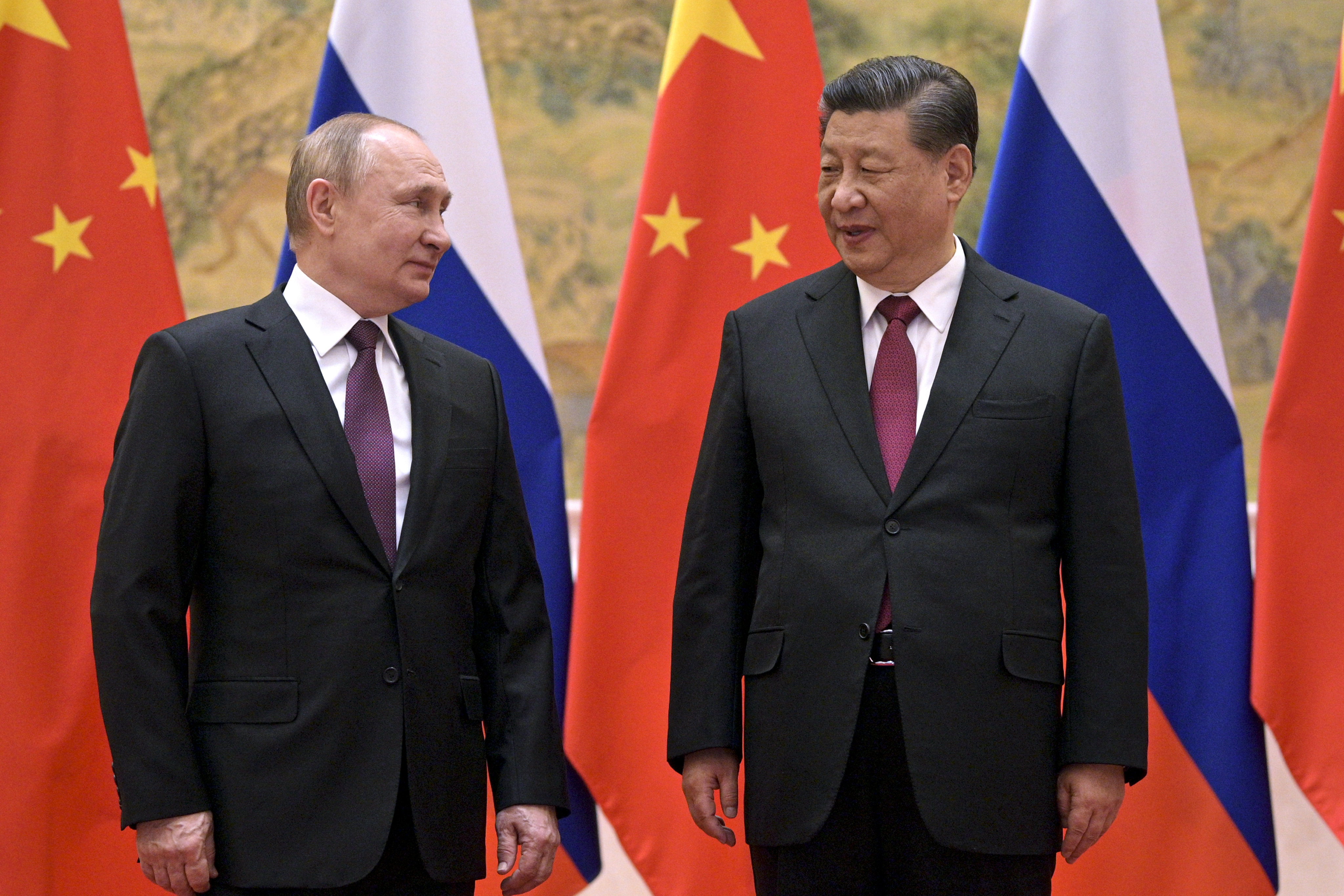 Russian President Vladimir Putin (left) meets Chinese President Xi Jinping in Beijing on February 4. Photo: Kremlin Pool via AP