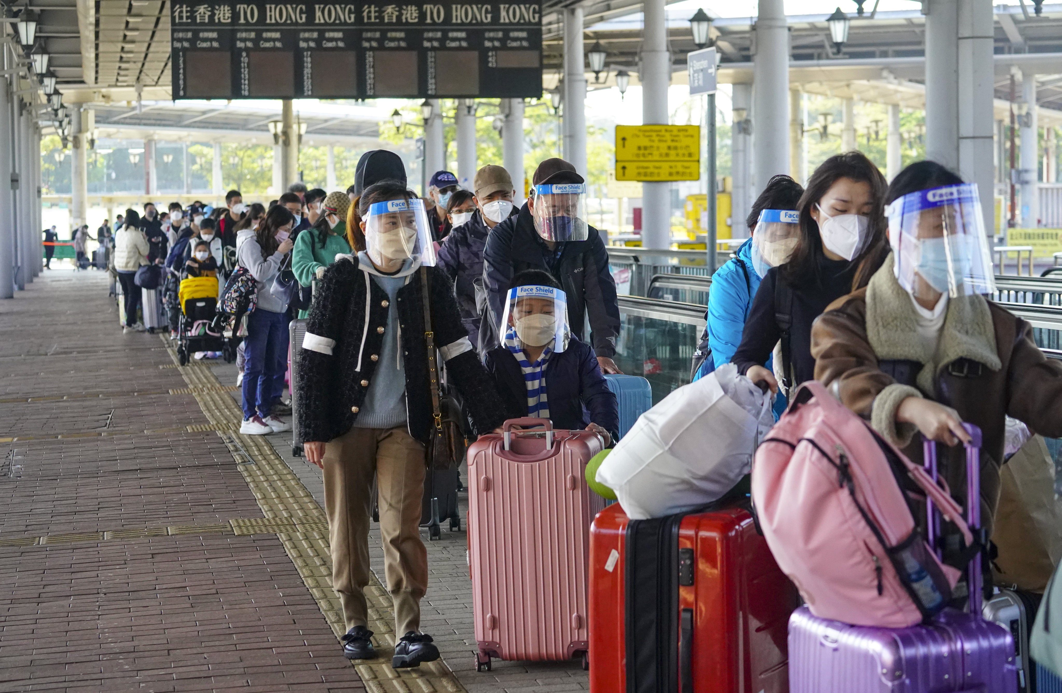 Cross-border travellers queue at Shenzhen Bay Control Point to enter mainland China. Photo: Felix Wong