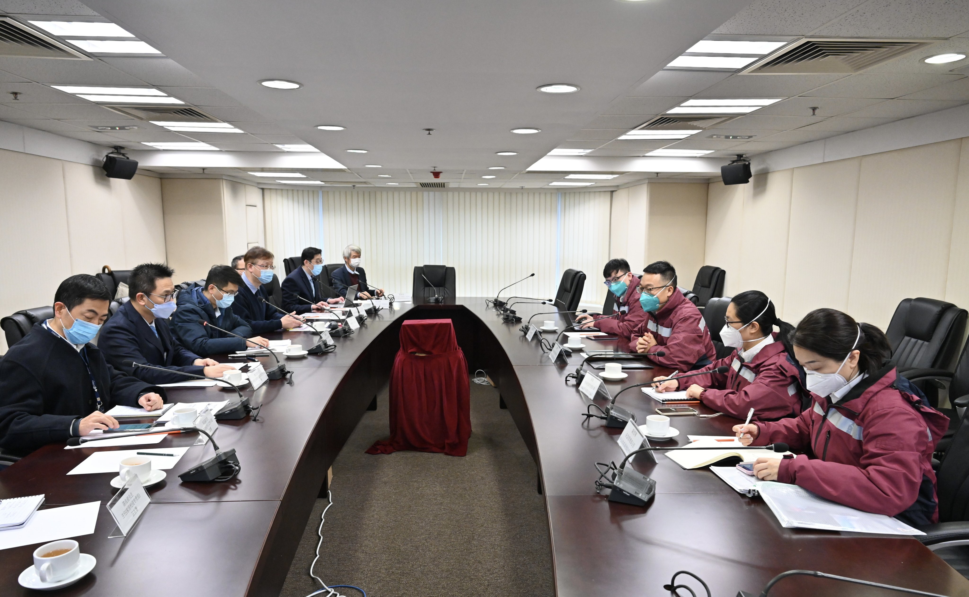 Mainland epidemiological experts exchange views with Hong Kong government officials in a meeting on February 20. A team of mainland China’s top epidemiologists arrived in Hong Kong last week to inspect Hong Kong’s anti-pandemic arrangements and advise the local government. Photo: Xinhua