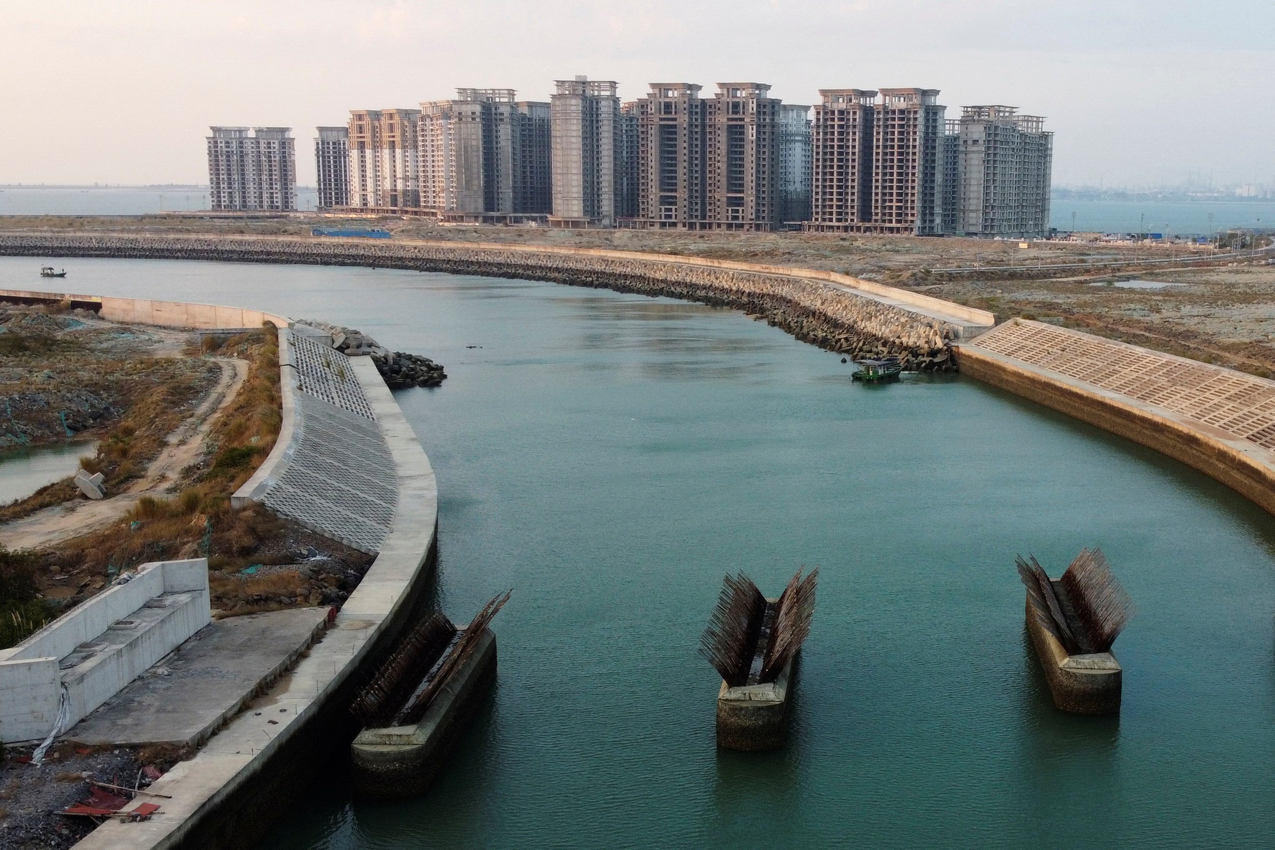 A view of unfinished buildings on the man-made Ocean Flower Island in Hainan province on January 6. Authorities have ordered the 39 buildings to be demolished, accusing developers China Evergrande Group of breaching regulations, in yet another blow to the indebted firm. Photo: Reuters