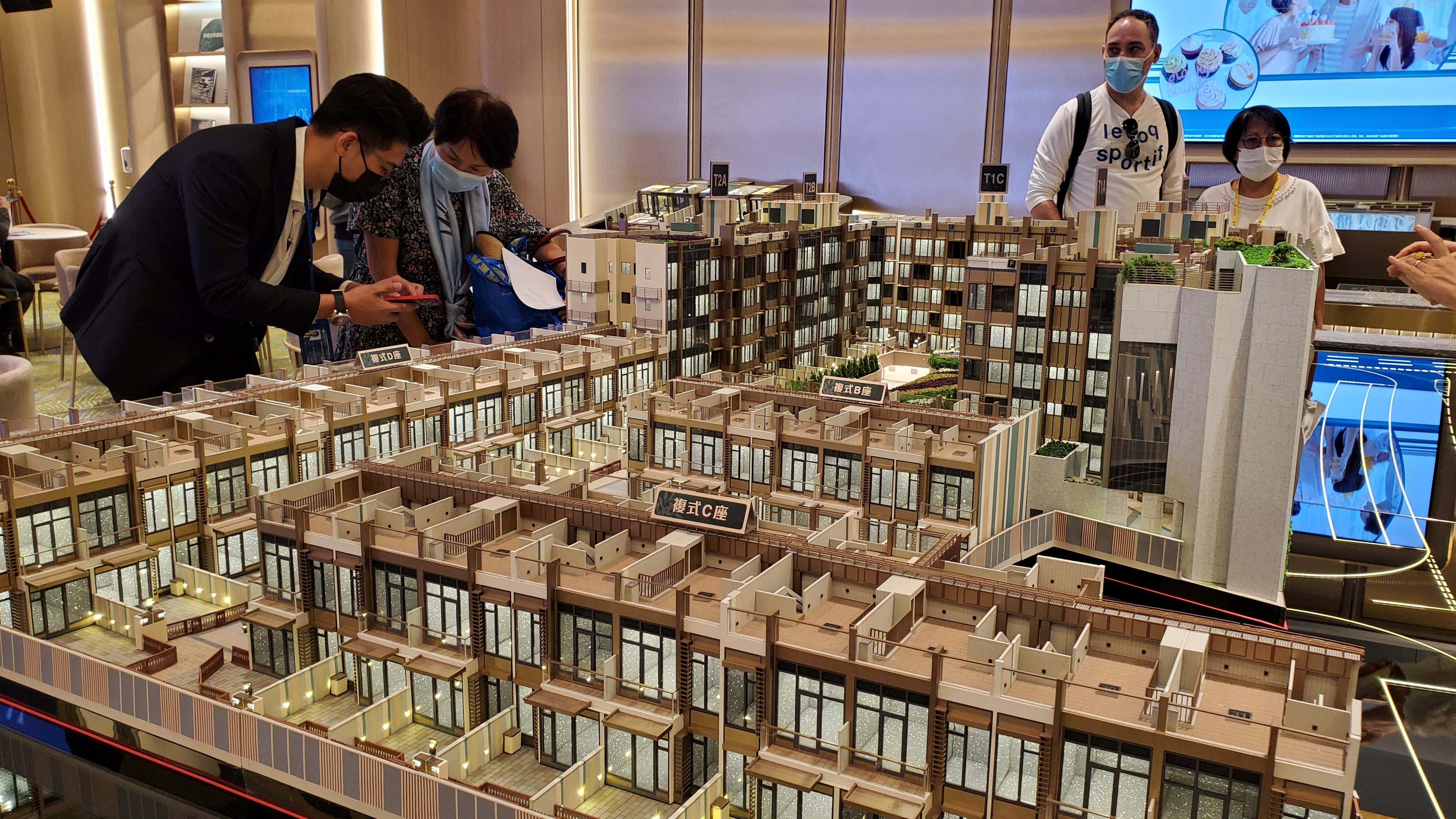 Potential buyers viewing an apartment model at the sales office of the #LYOS housing project at CK Asset Holding’s sales office in Hung Hom on 4 November 2021. Photo: Edmond So
