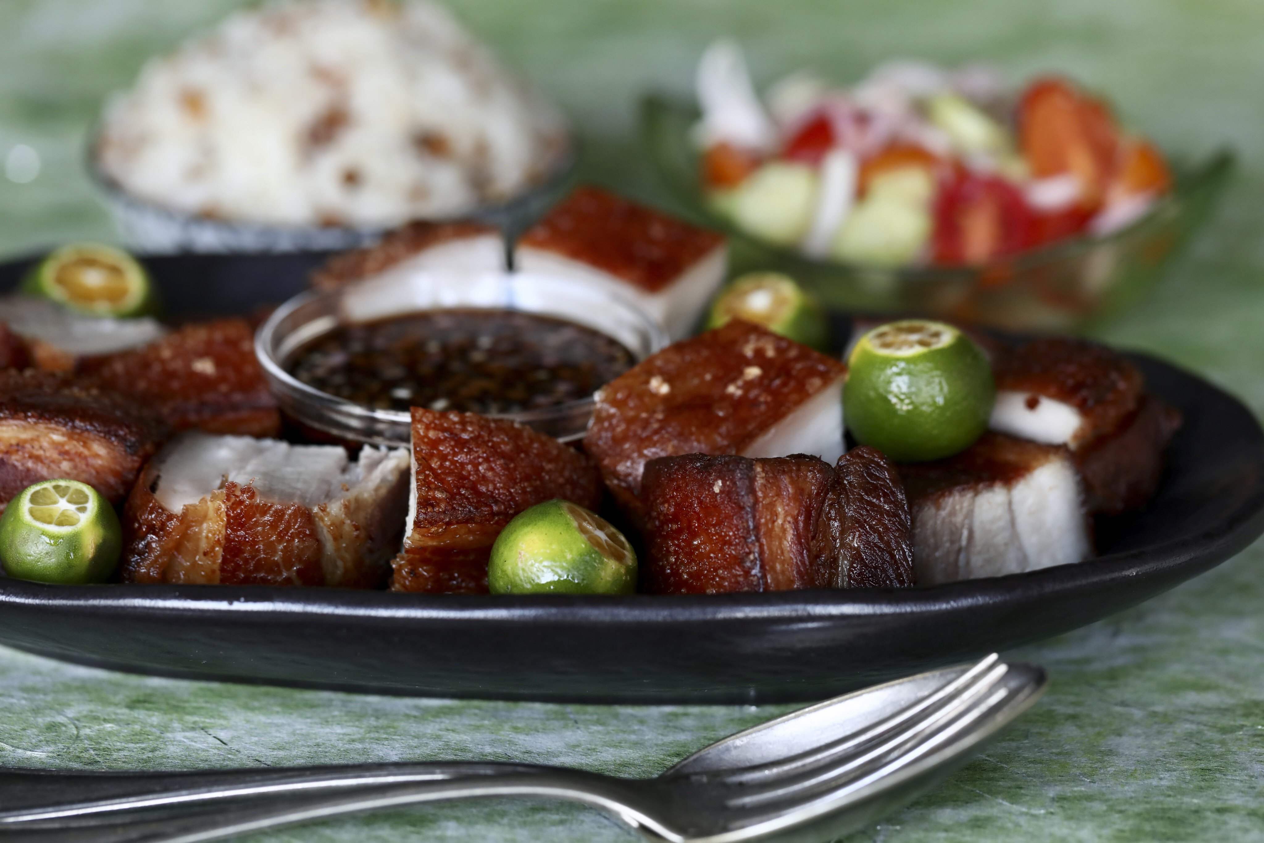 This deep-fried pork belly dish (lechon kawali) is a version of the Filipino whole roast pig dish. Photo: Jonathan Wong