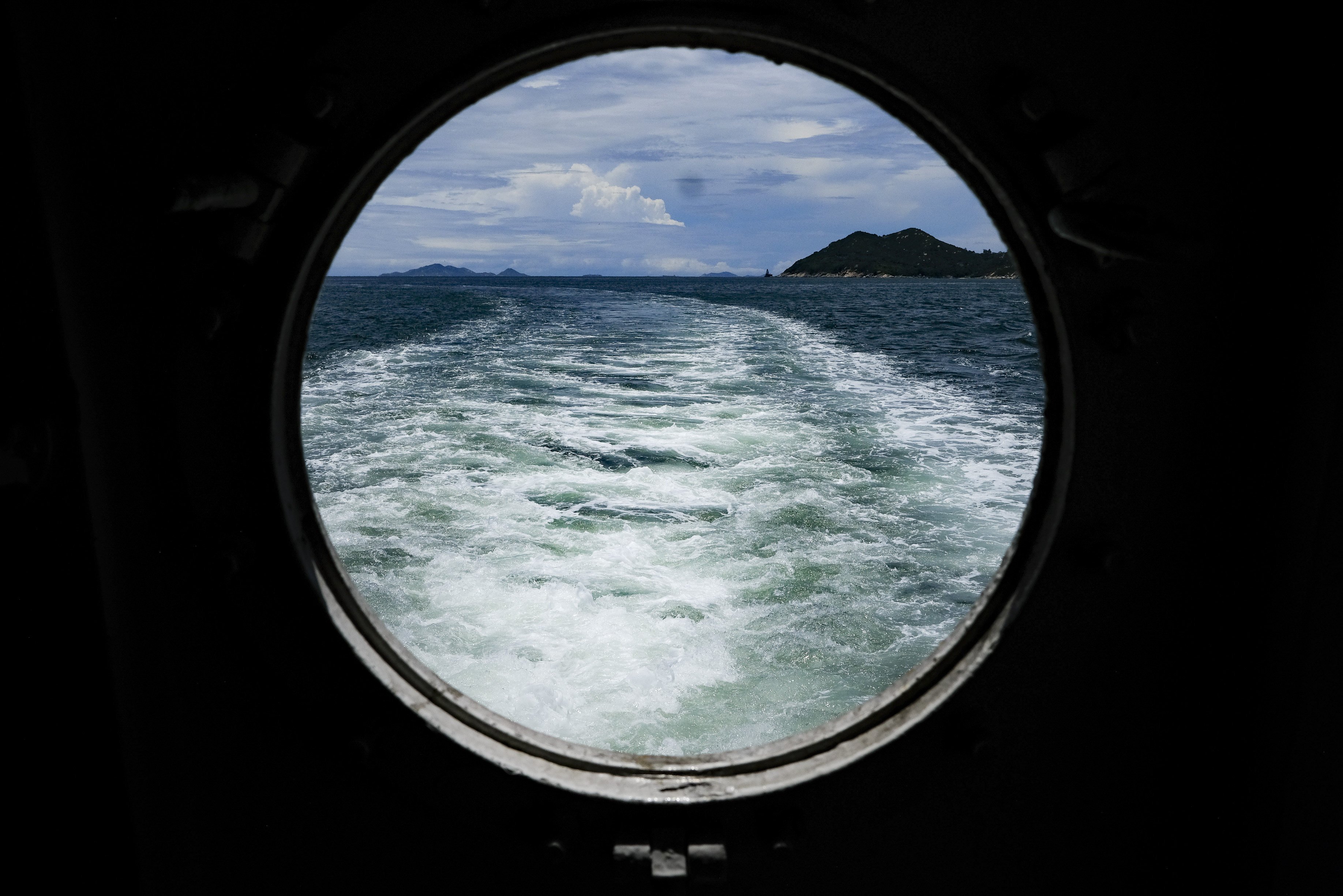 View from the toilet on the Ming River inter-islands ferry, or locally known as “kaito”, that commutes between Hong Kong’s outlying islands of Cheung Chau and Peng Chau, with stops at Mui Wo and briefly at Chi Ma Wan, several times a day.  30JUL20  SCMP / James Wendlinger  [FEATURES]