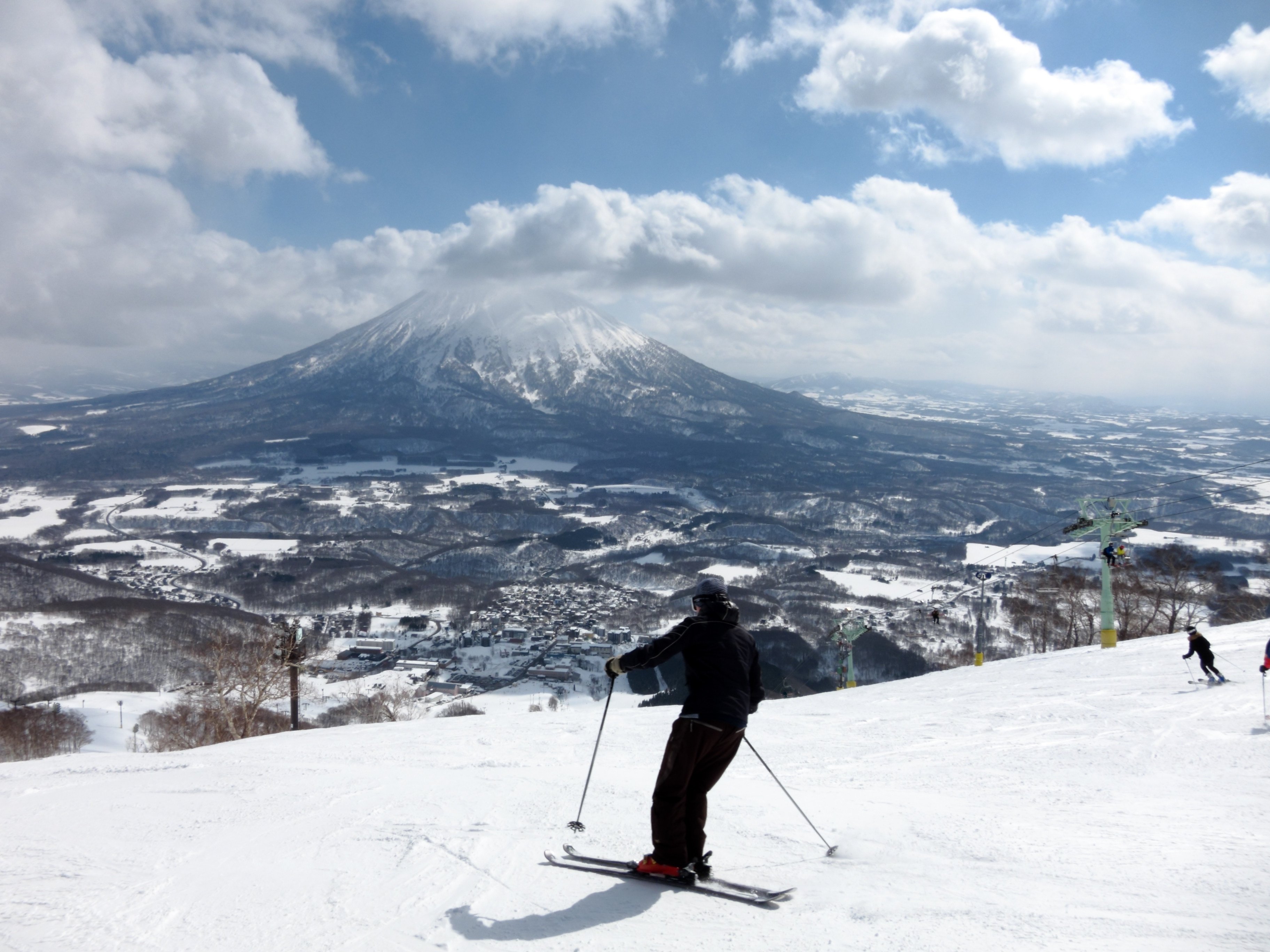 Skiing in Hokkaido with Mount Yotei in the background. Photo: Shutterstock