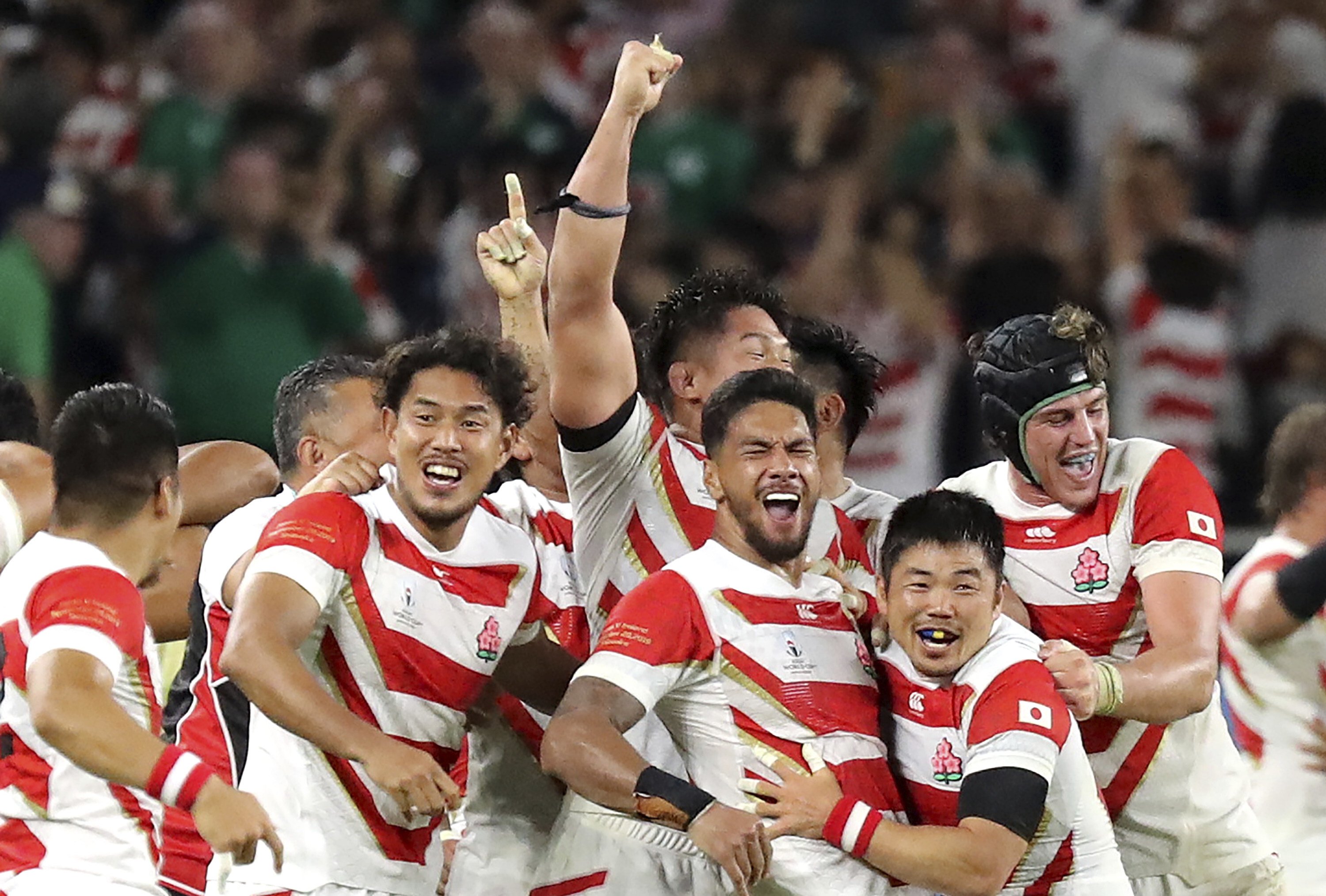 Japan’s players celebrate after beating Ireland during the 2019 Rugby World Cup. Photo: AP
