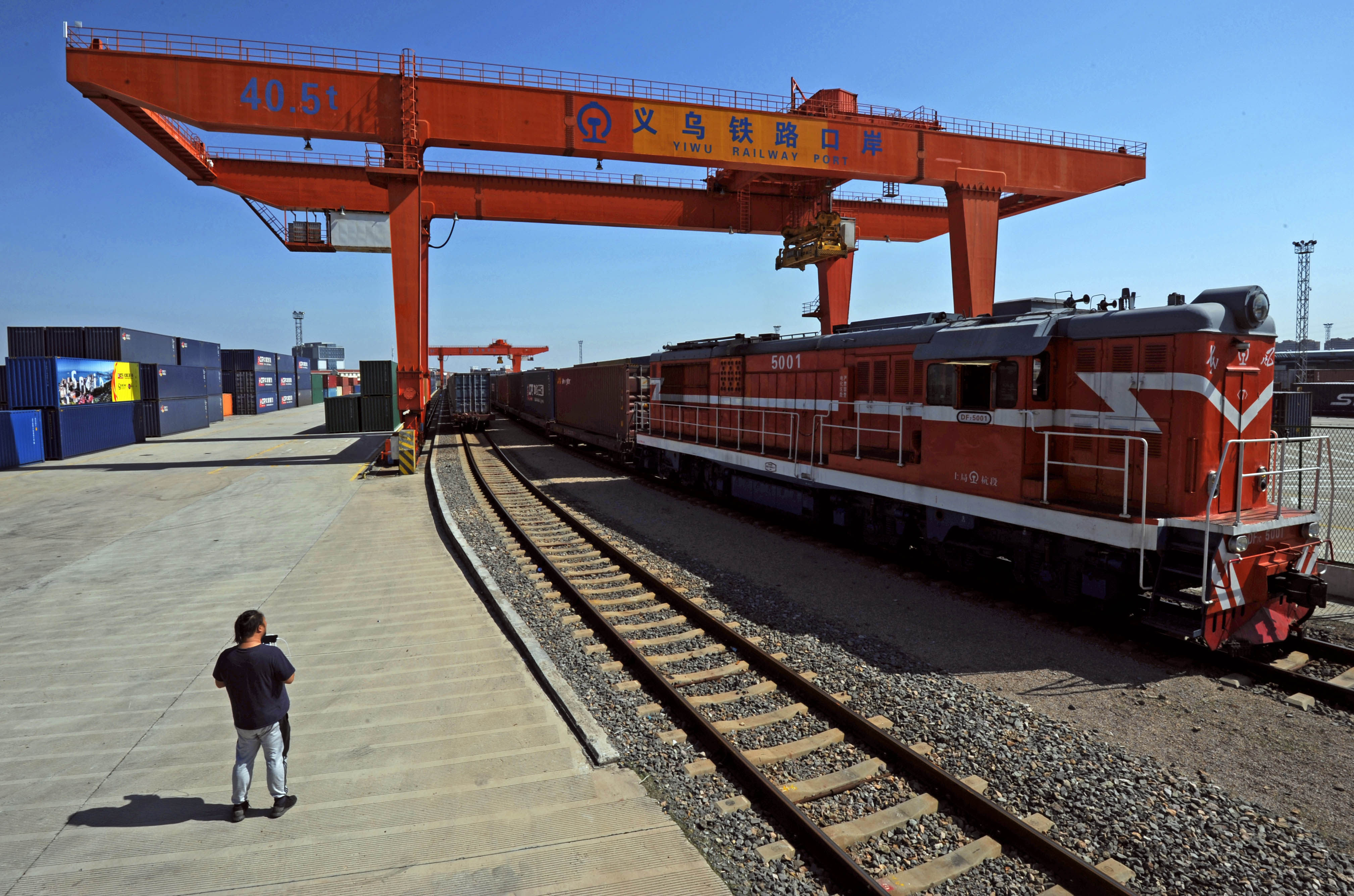 A China-Europe freight train leaves the railway station in Yiwu, a city in eastern Zhejiang province, bound for Madrid in Spain. Photo: Xinhua
