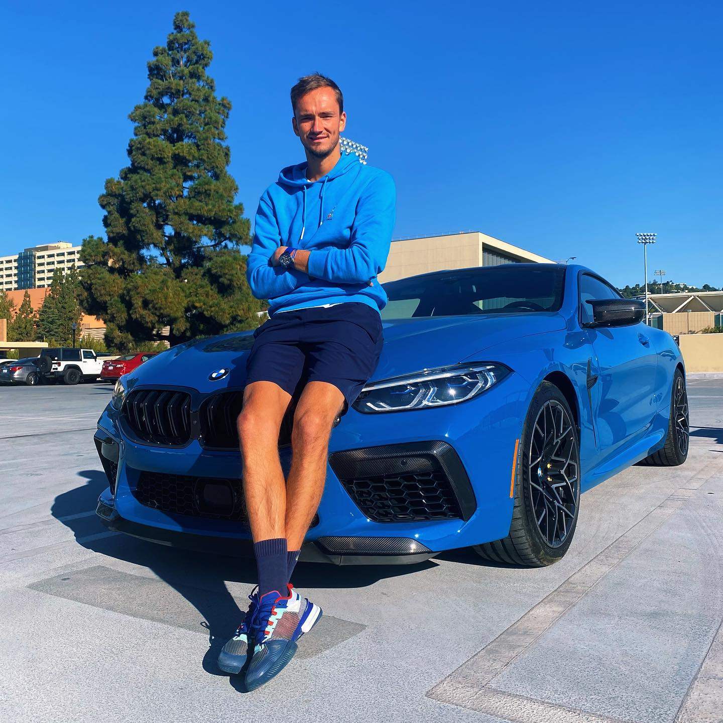 Daniil Medvedev and one of his BMWs, but how much has the Russian tennis star earned? Photo: @medwed33/Instagram