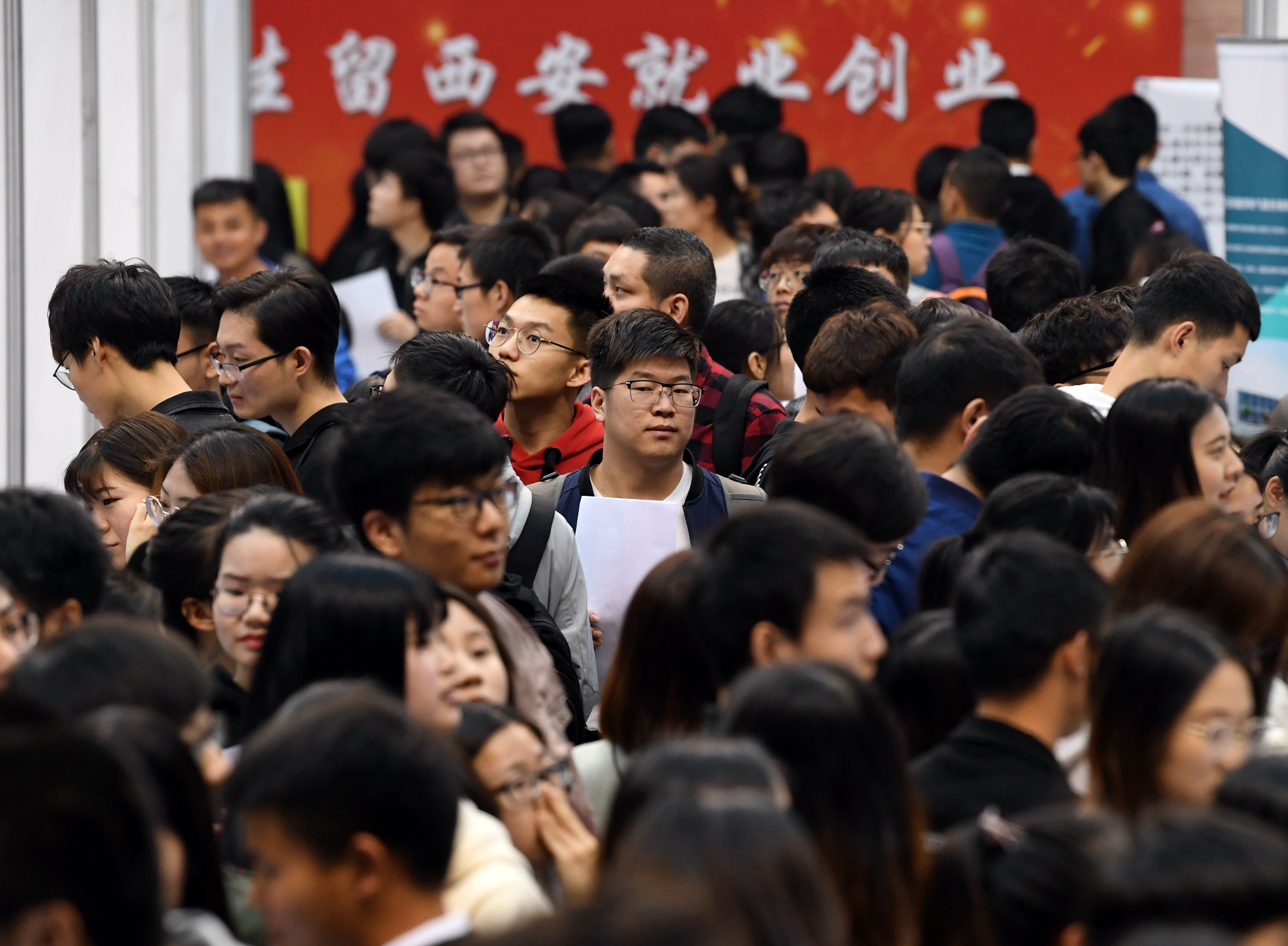 A record 10.76 million university students will graduate in China this year, and young jobseekers are doing all they can to stand out in the crowd. Photo: Xinhua