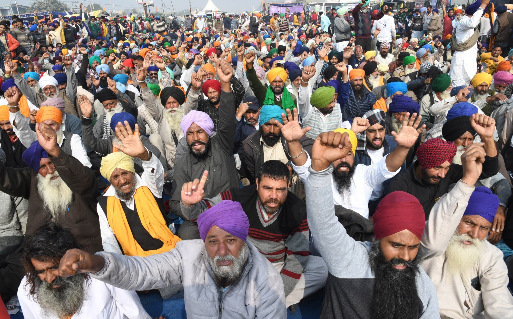 Thousands of Indian farmers gathered and tried to cross sealed New Delhi border points to hold protests against the government’s new farm laws December 2020. Photo: EPA-EFE/STR