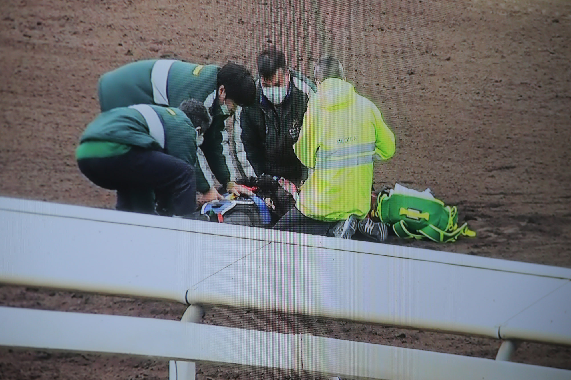 Jockey Luke Currie receives treatment after falling in a Sha Tin barrier trial. Photo: Kenneth Chan.