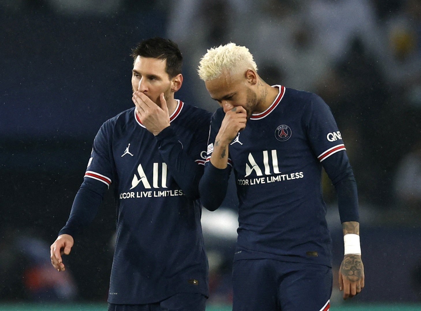 Paris Saint Germain forwards Lionel Messi (left) and Neymar in a Uefa Champions League round of 16 first leg game against Real Madrid at the Parc des Princes in France. Photo: Reuters   