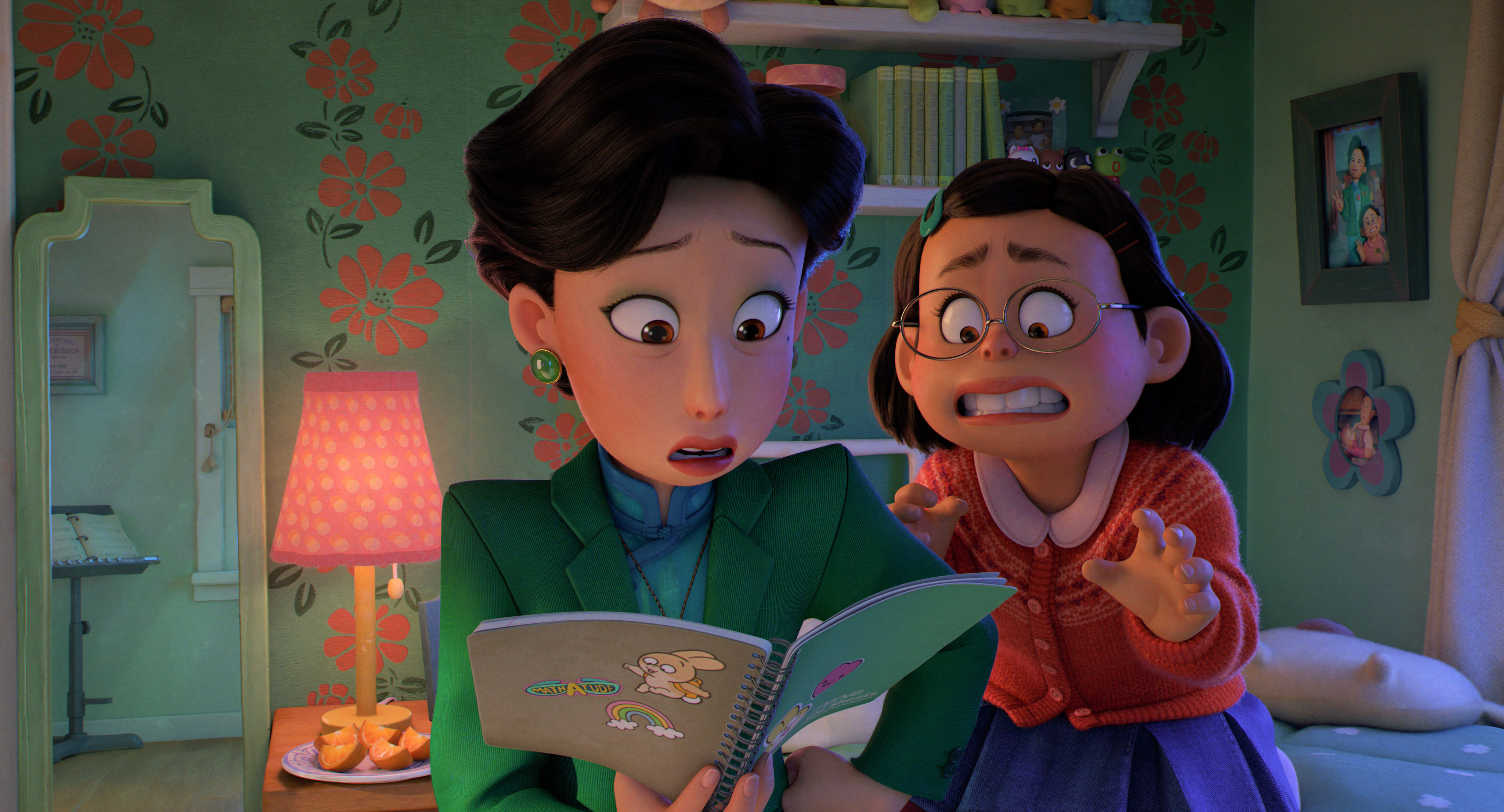 Mei Lee (right, voiced by Rosalie Chiang) and Ming (Sandra Oh) in a still from Turning Red. Photo: Disney/Pixar.