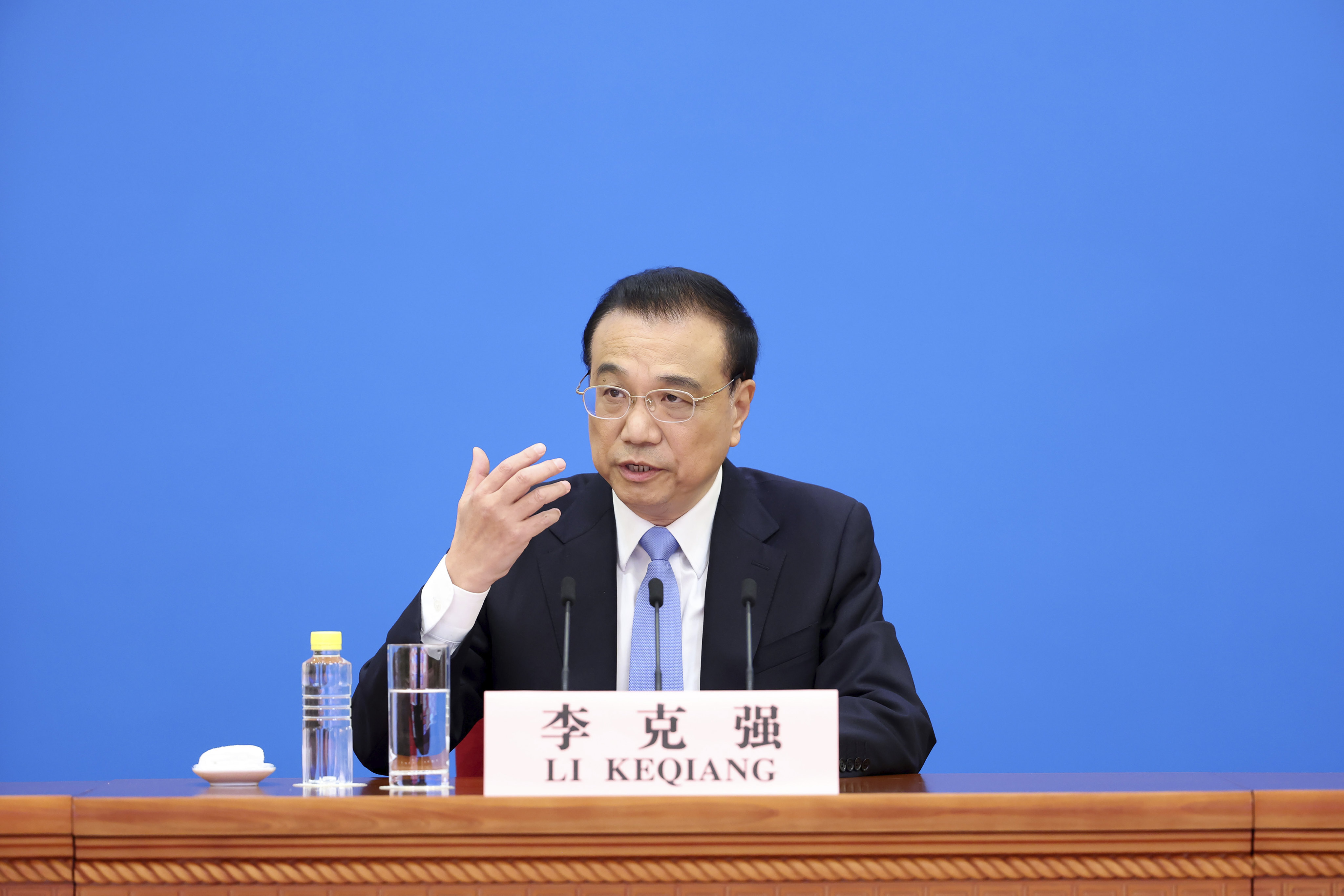 Chinese Premier Li Keqiang speaks during a press conference on Friday. Photo: AP