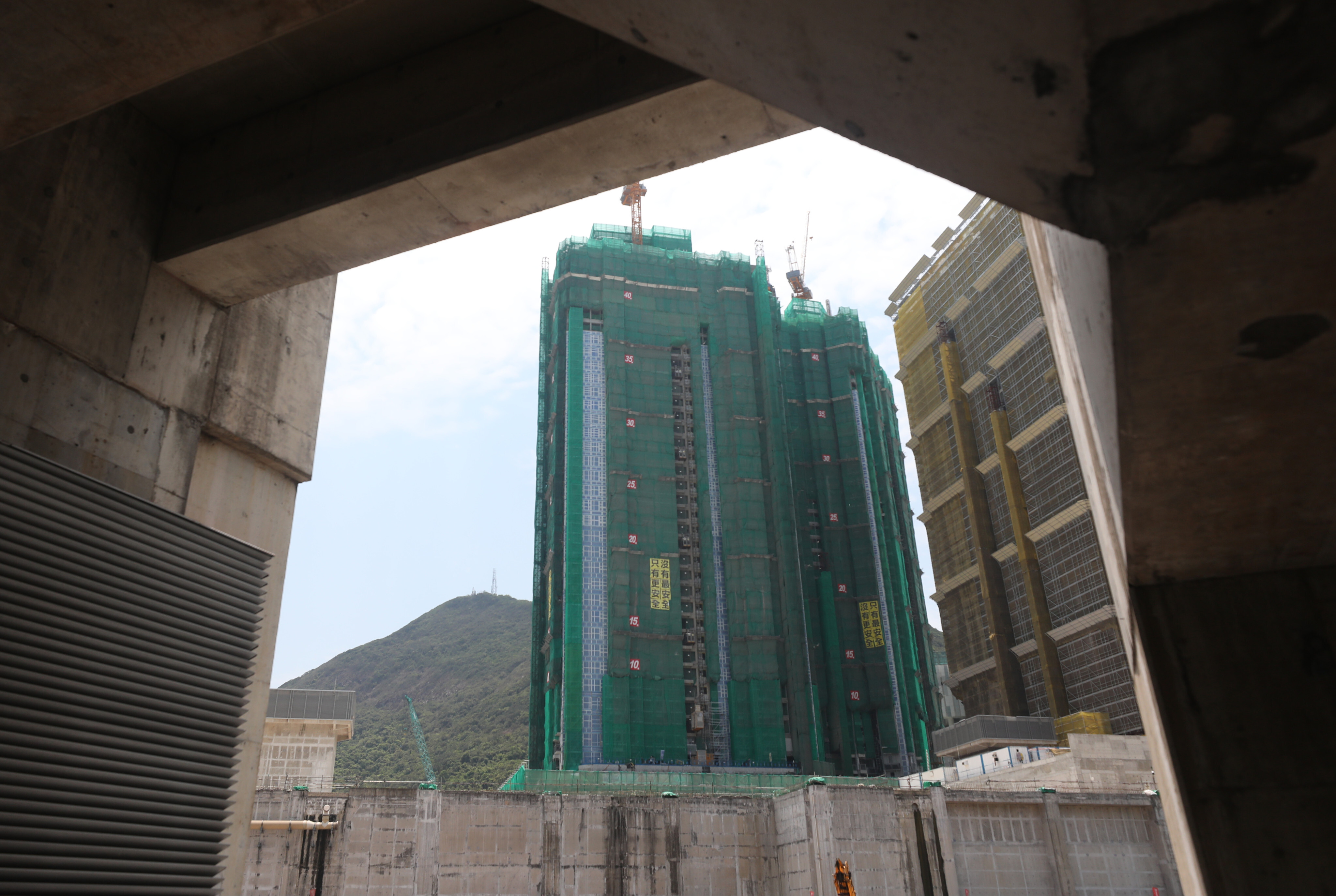 A construction site in Hong Kong. One of the most cost-effective solutions to tackle climate change is through the buildings sector, since buildings contribute around 39 per cent of the annual global CO2. Photo: Xiaomei Chen