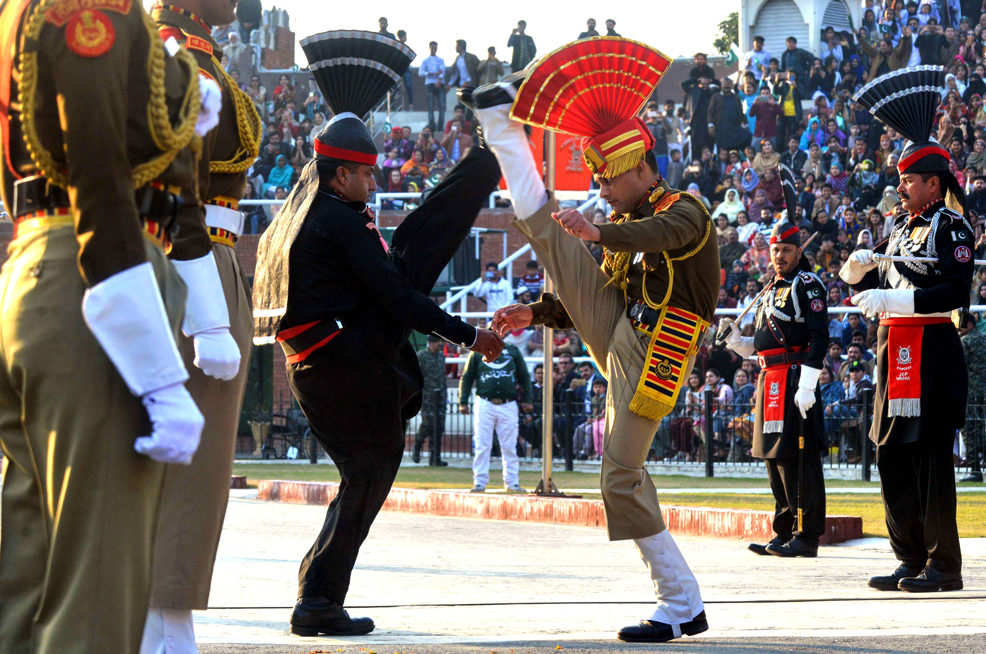 Indian Border Security Force personnel and Pakistani Rangers take part in the Beating Retreat ceremony during the Republic Day celebrations at the India-Pakistan Wagah border post on January 26, 2019. Photo: AFP