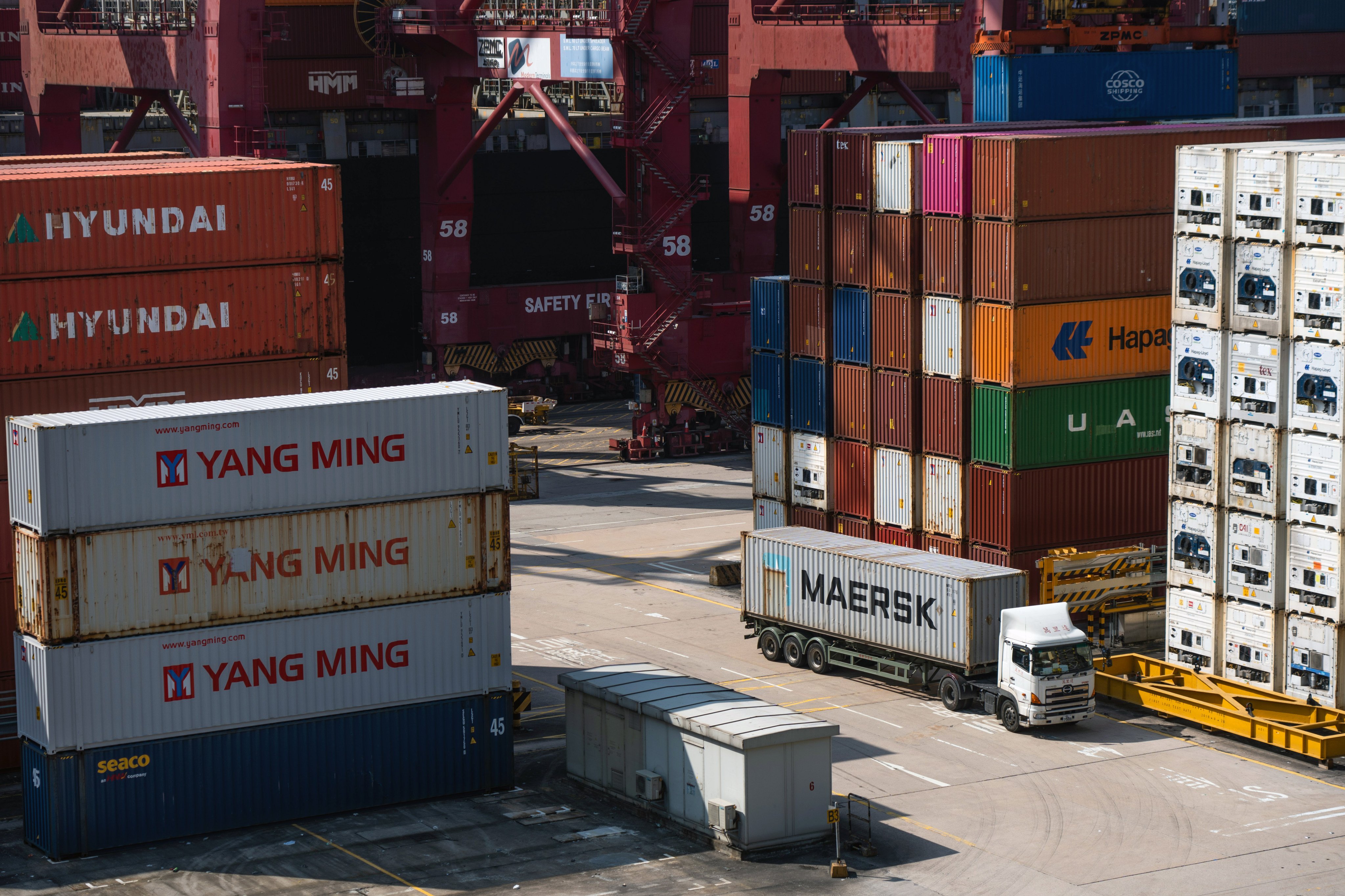 Shipping containers are piled up at the Kwai Tsing Container Terminals on March 14. Hong Kong has long championed the global transportation of high value-added products. Photo: Bloomberg