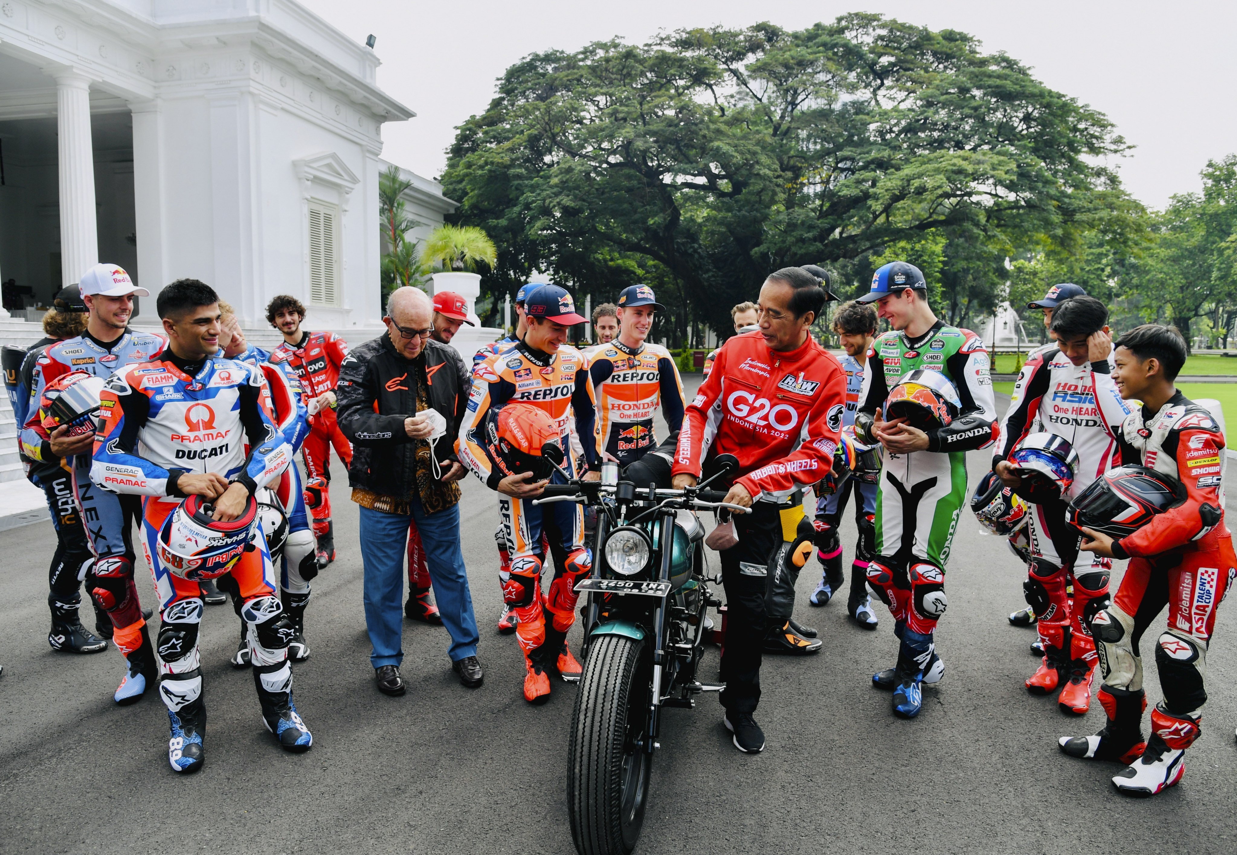 Indonesia’s President Joko Widodo (C) and his motorbike during a meeting with MotoGP riders in Jakarta on Wednesday. The 
nation hosts a MotoGP race at the new Mandalika circuit on the island of Lombok 18-20 March. Photo: EPA-EFE