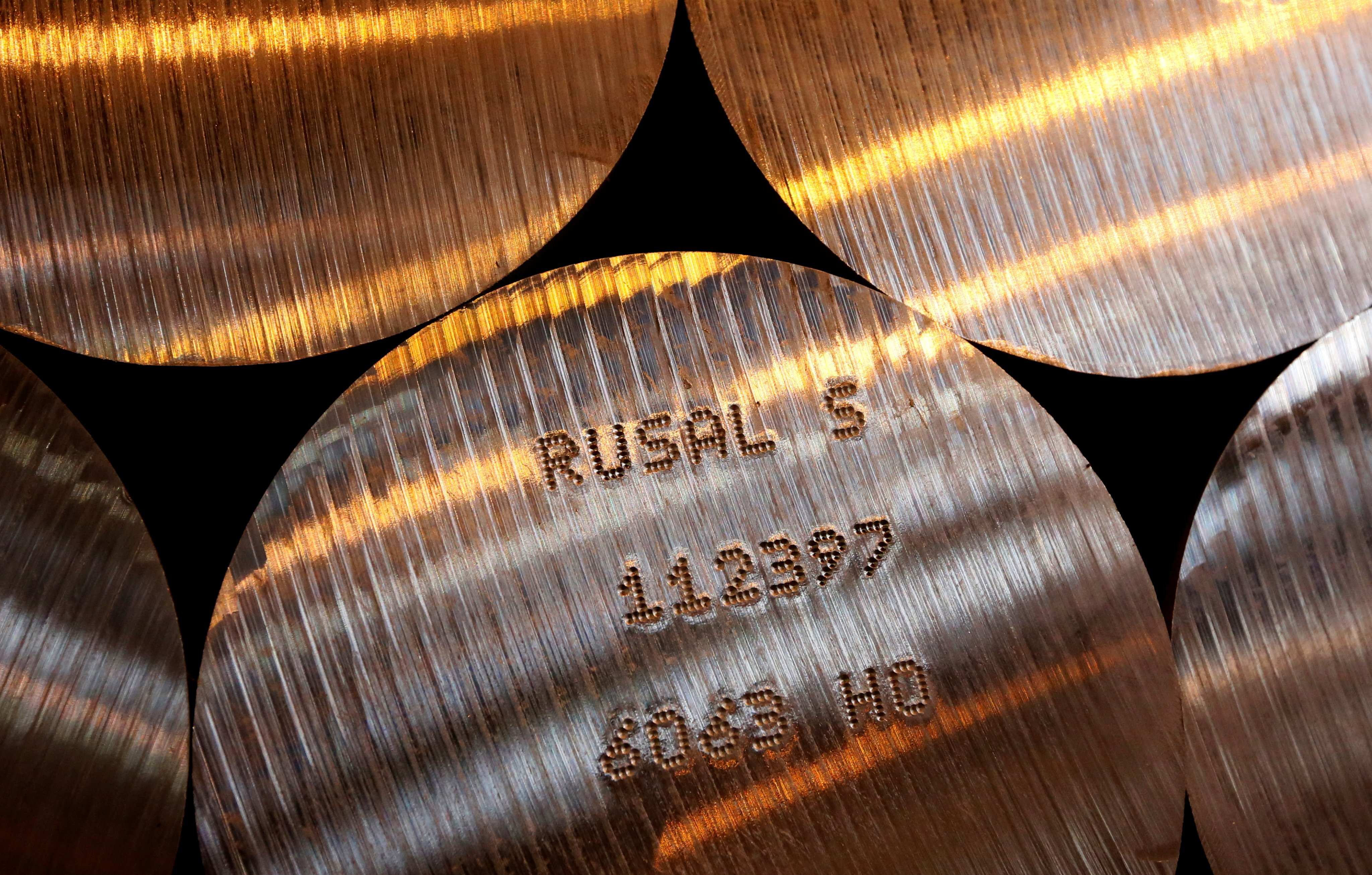 Marked cylindrical aluminium ingots are seen stored at Rusal’s Sayanogorsk aluminium smelter outside the Siberian town of Sayanogorsk in Russia, in this file photo from March 2017. Photo: Reuters