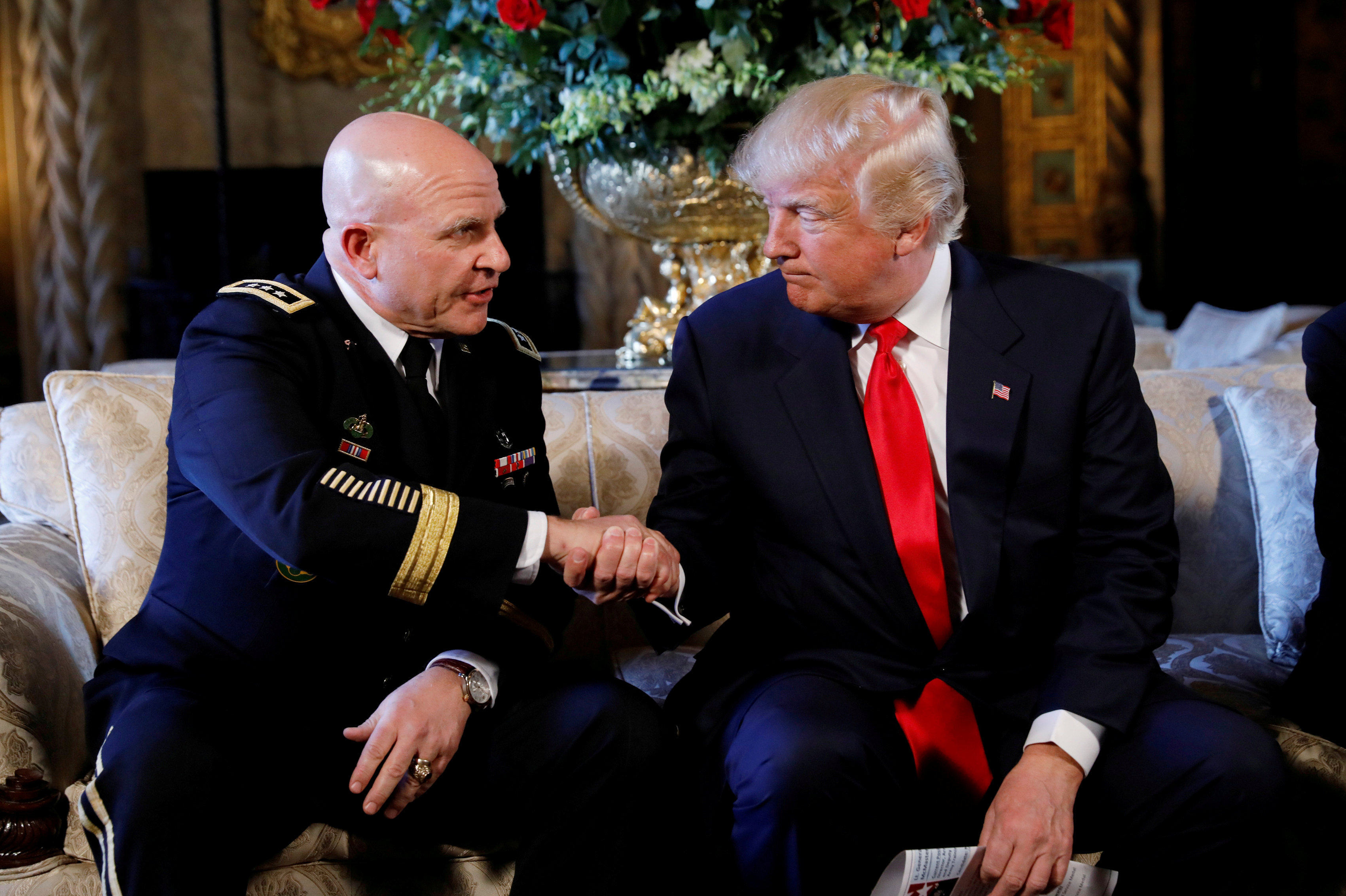 HR McMaster shakes hands with then US president Donald Trump when he was named national security adviser in February 2017. Photo: Reuters