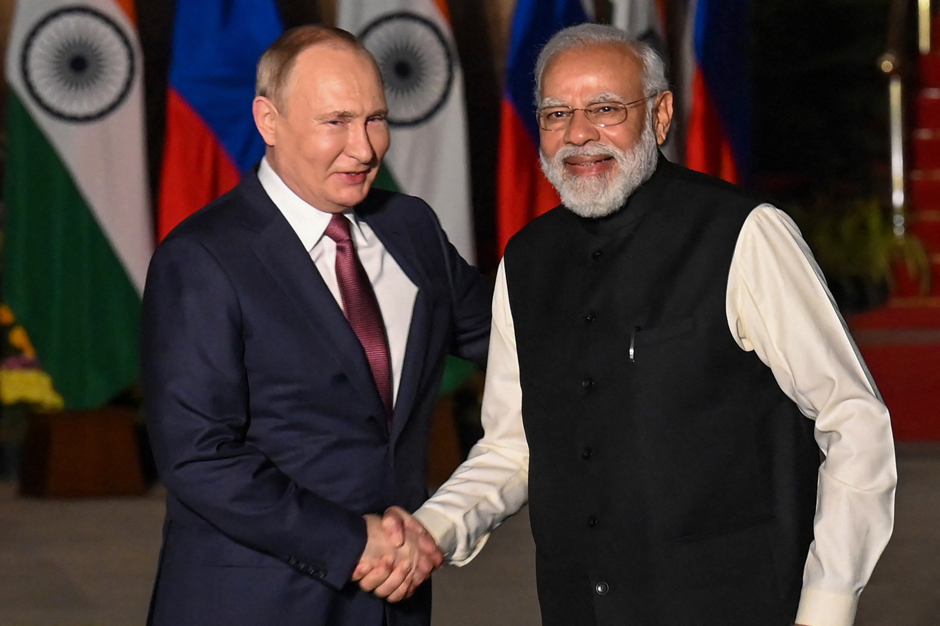 Indian Prime Minister Narendra Modi greets Russian President Vladimir Putin before their December meeting in New Delhi. Photo: AFP via Getty Images/TNS