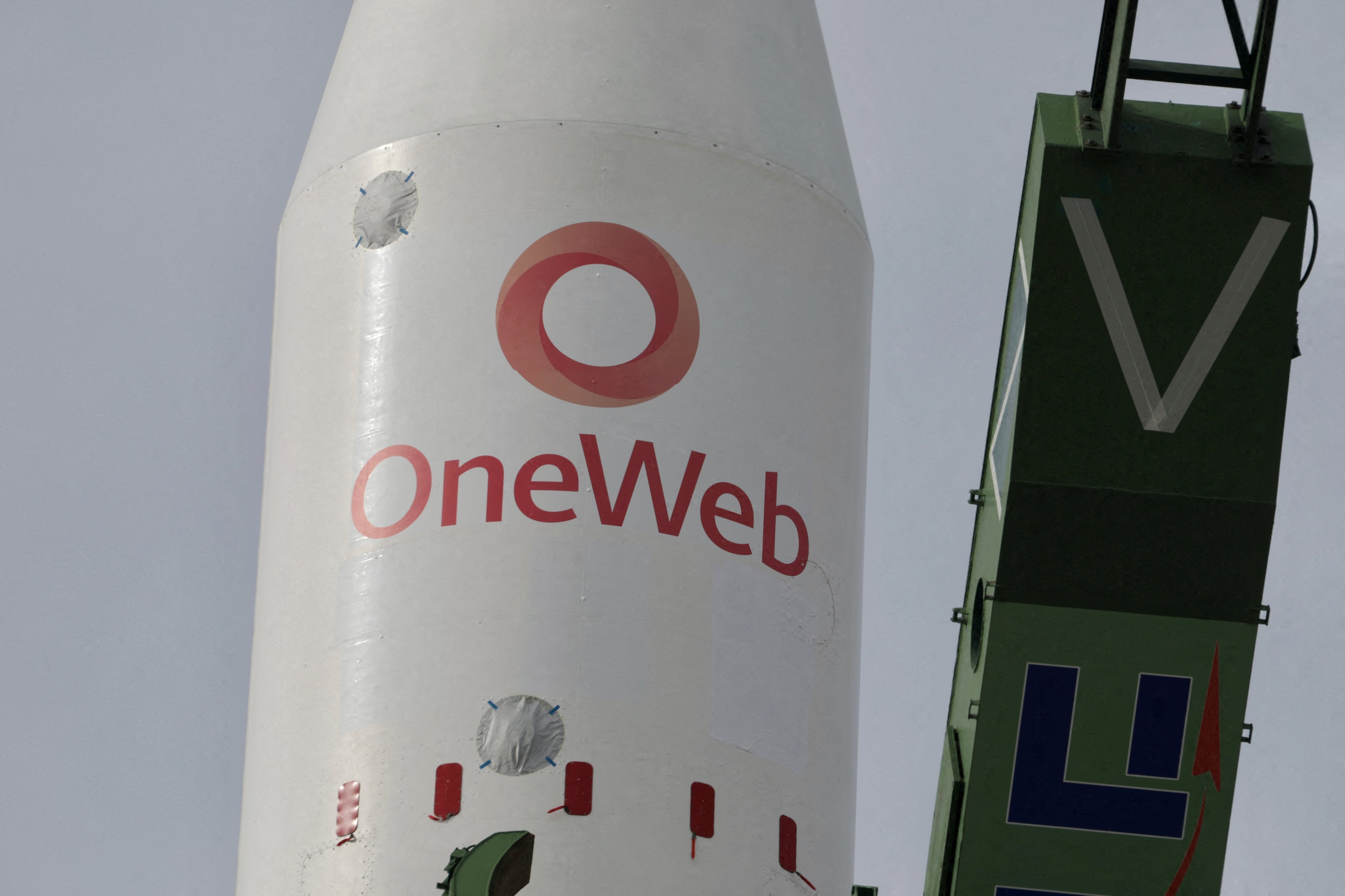 A Soyuz-2.1b rocket booster with a Fregat upper stage and satellites of British firm OneWeb is removed from a launchpad after the launch was cancelled at the Baikonur Cosmodrome, Kazakhstan, on March 4, 2022. Photo: Roscosmos via Reuters
