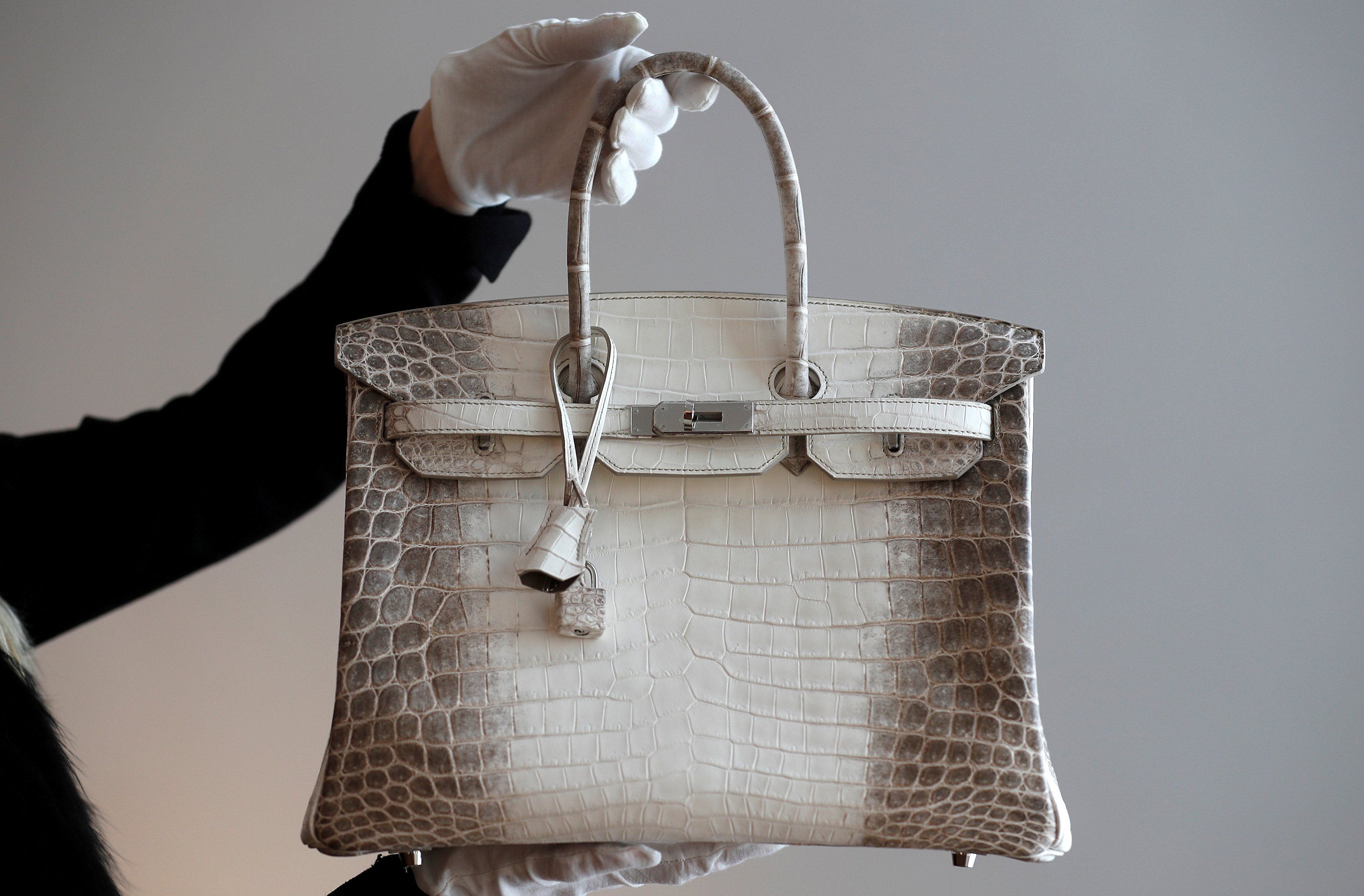 A chance meeting aboard an aeroplane led to the creation of one of the most sought-after luxury accessories, the Hermès Birkin handbag, and this matt white Birkin Himalaya 35 is a still-rarer edition. Photo: Reuters