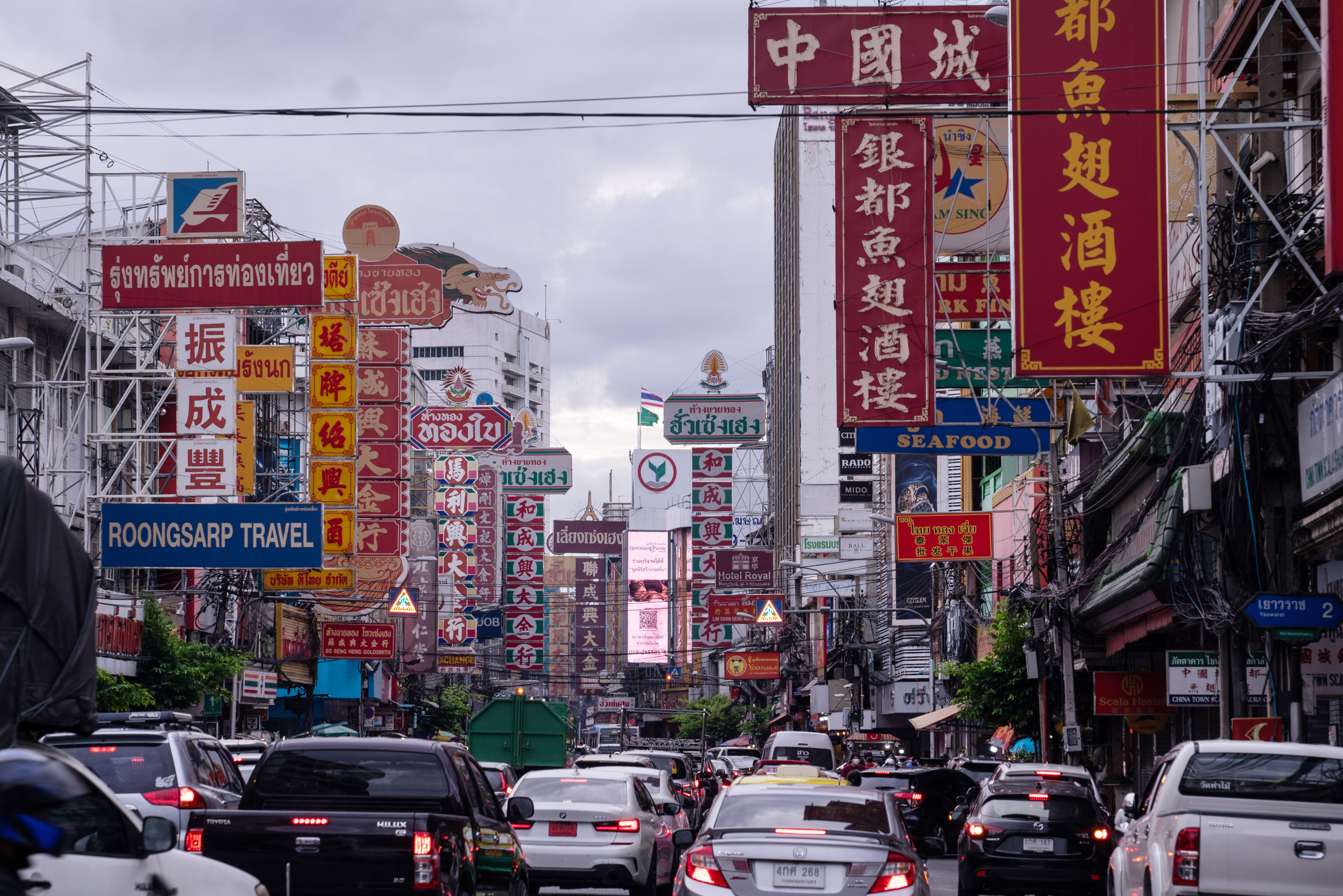 Signs in Thai and Chinese are seen along Yaowarat Road in the Chinatown area of Bangkok. Photo: Bloomberg