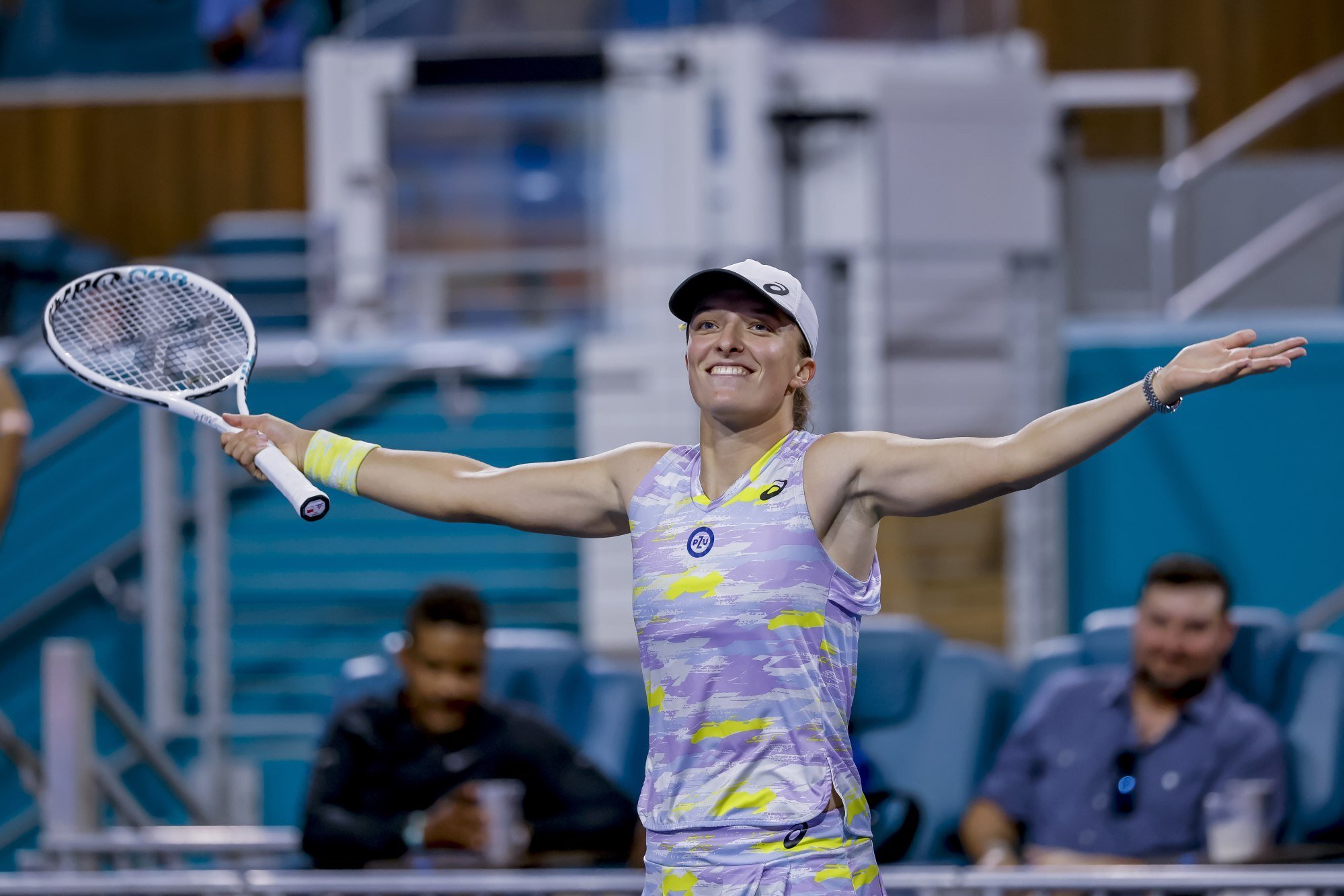 Iga Świątek of Poland reacts after defeating Viktorija Golubic of Switzerland during a second-round match of the Miami Open tennis tournament at Hard Rock Stadium in Miami Gardens, Florida, on March 25. Photo: EPA-EFE