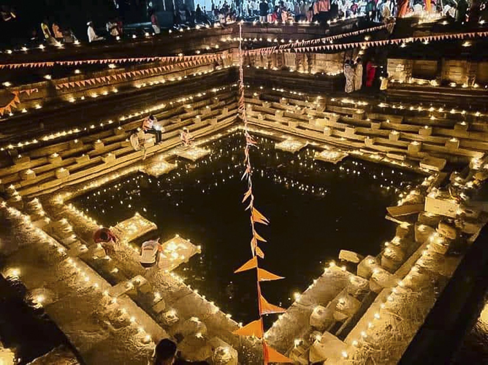 A stepwell in Deulgaon Village, in Ahmednagar District, in India’s  Maharashtra state, lit with diyas, or small earthen lamps, on the annual Hindu festival of Maha Shivaratri.