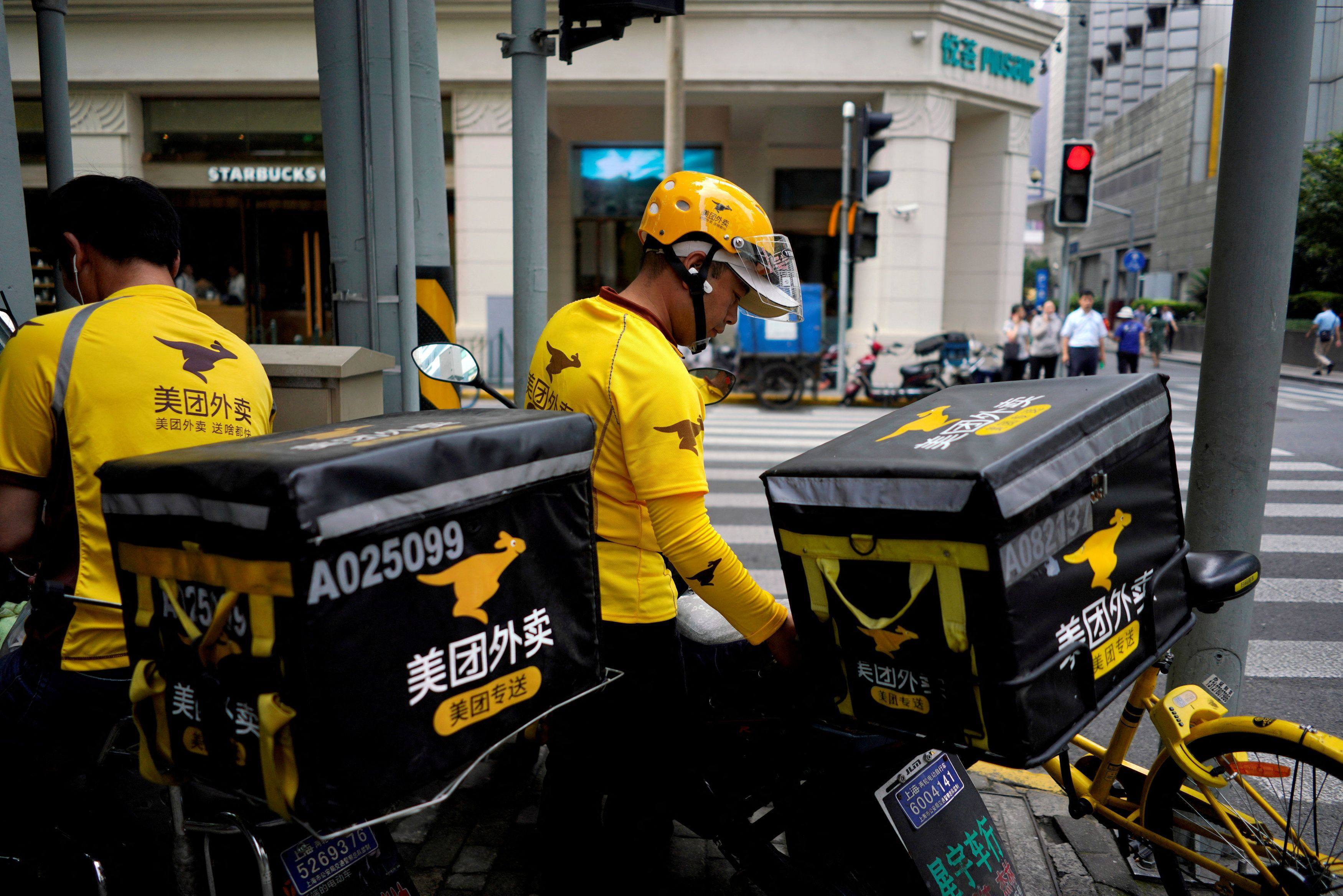 Meituan drivers in Shanghai. The company was able to raise US$4.2 billion in a Hong Kong IPO in the heydays of 2018. Photo: Reuters