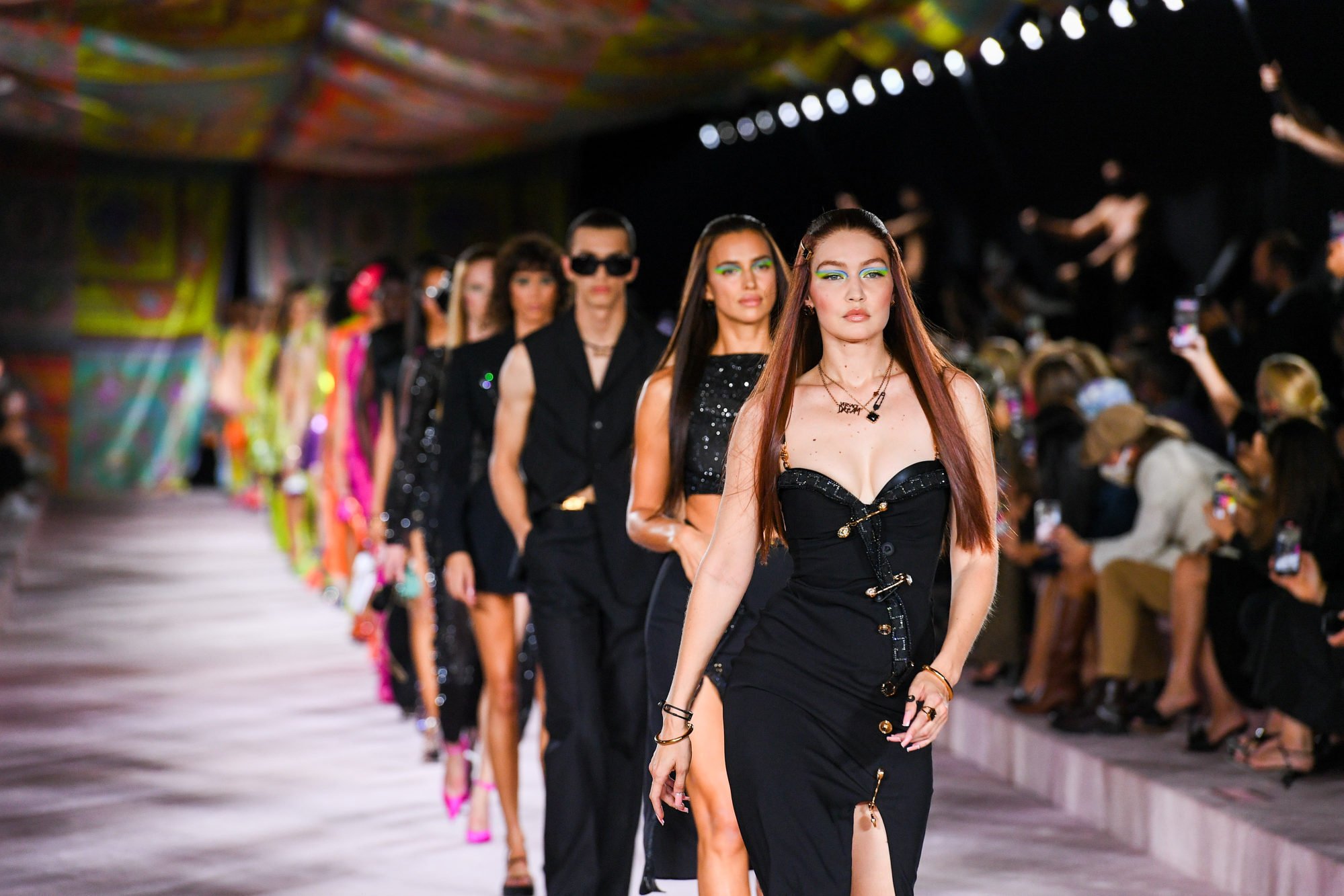 Bella Hadid wears a creation as part of the Versace Fall/Winter 2022-2023  fashion collection, unveiled during the Fashion Week in Milan, Italy,  Friday, Feb. 25, 2022. (AP Photo/Antonio Calanni Stock Photo - Alamy