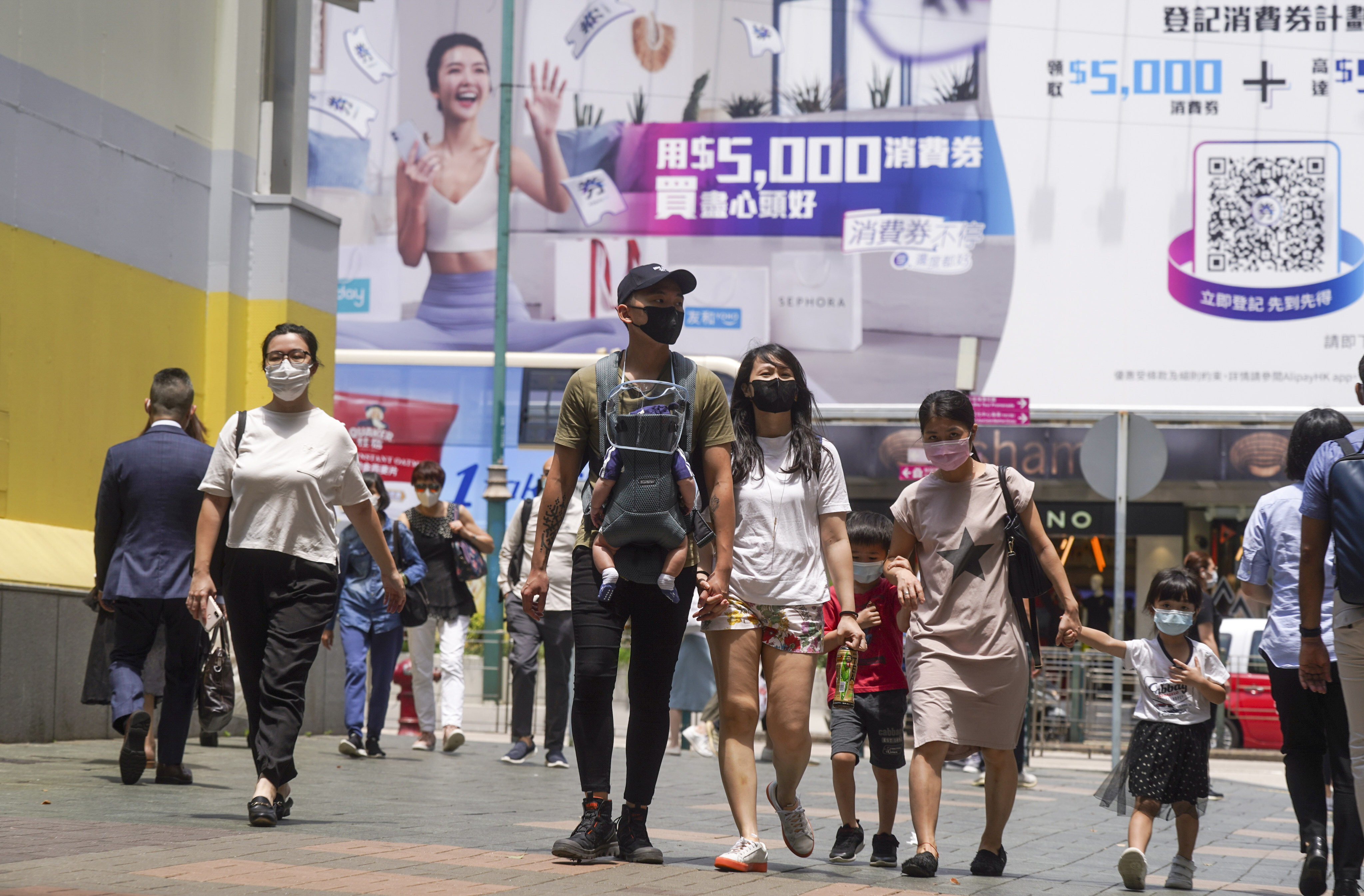Hong Kong’s mall owners are tempting shoppers with discounts and offers with an eye on the HK$5,000 e-vouchers that will issued to 6.2 million eligible residents from Thursday. Photo: Sam Tsang