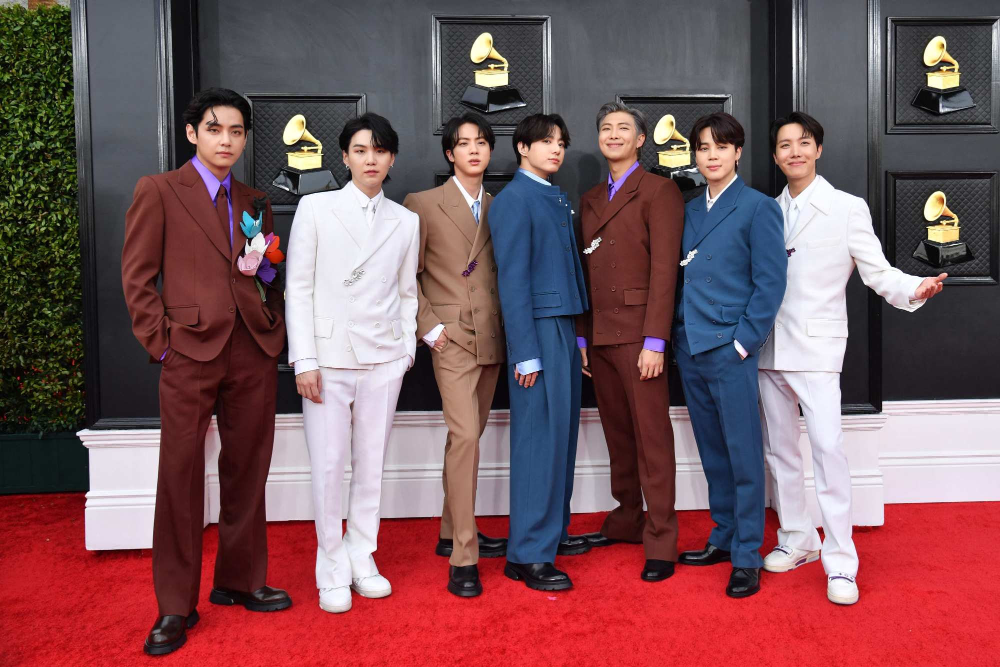 BTS showed up in double-breasted Louis Vuitton suits in an array of different colours. Photo: AFP