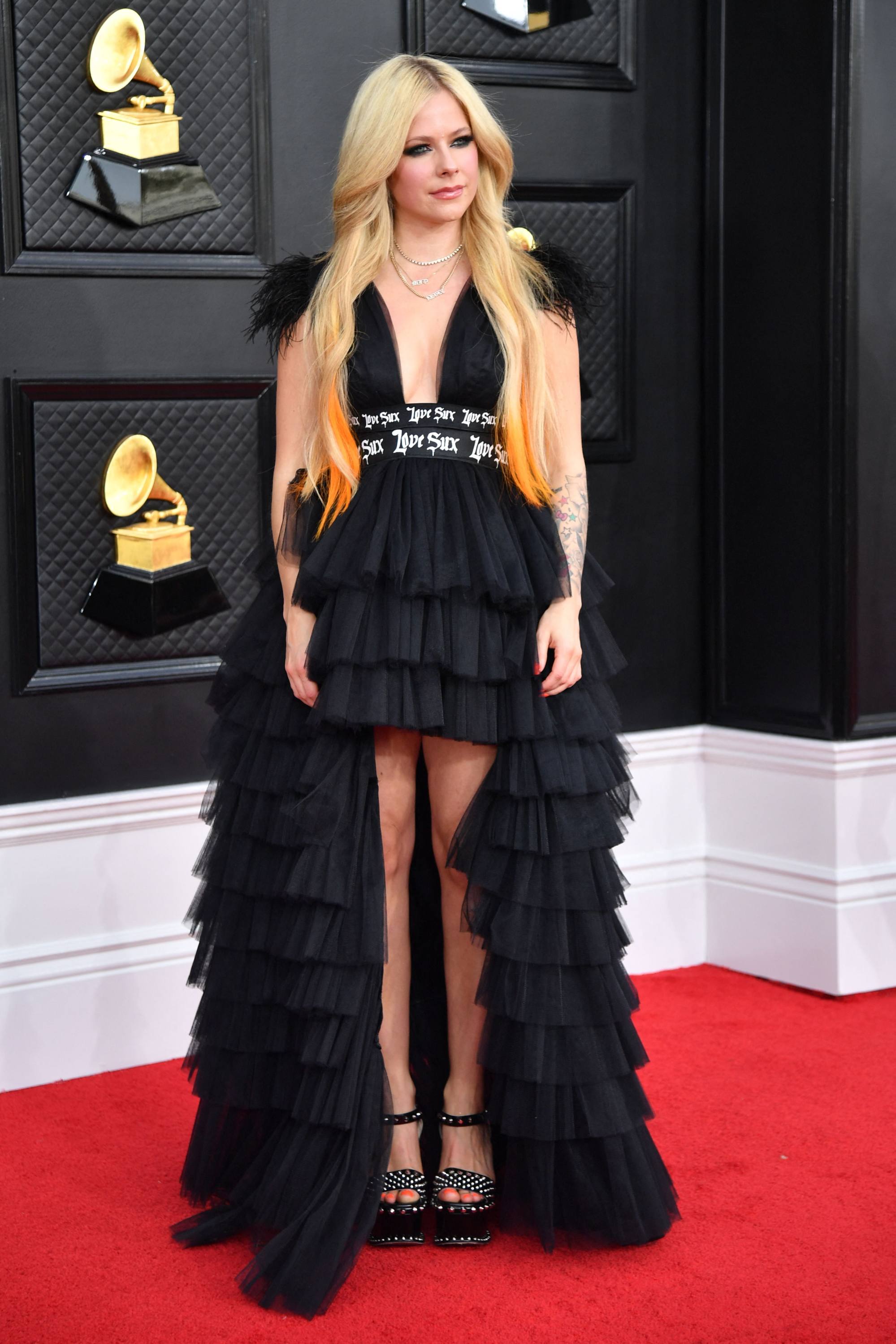 Canadian singer Avril Lavigne arrives for the 2022 Grammys, but we feel like it could have been the 2002 Grammys. Photo: AFP