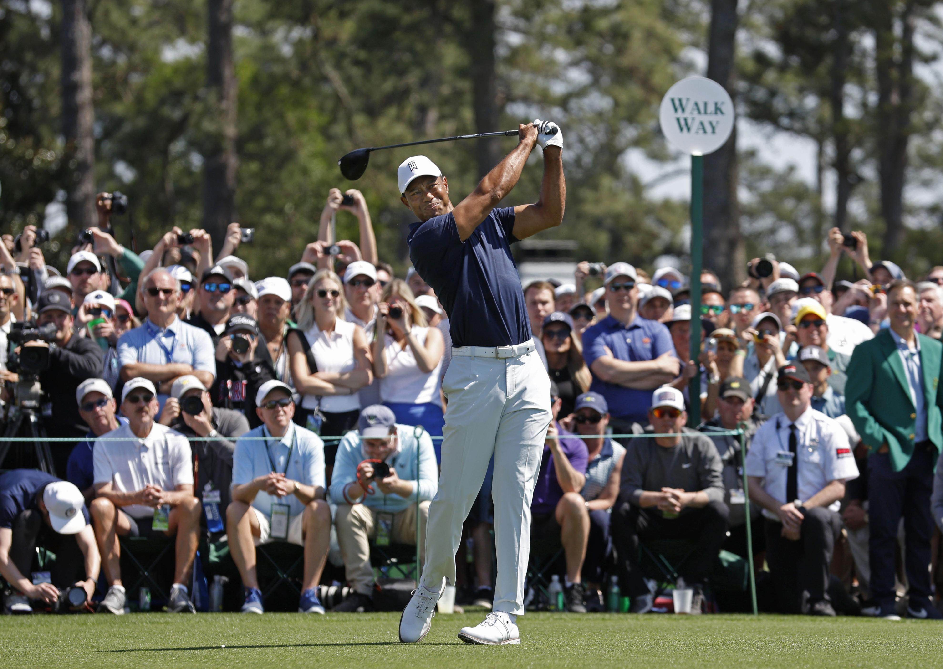 Tiger Woods of the United States plays a practice round ahead of the Masters Tournament at Augusta National Golf Club in Augusta, Georgia. Photo: Kyodo