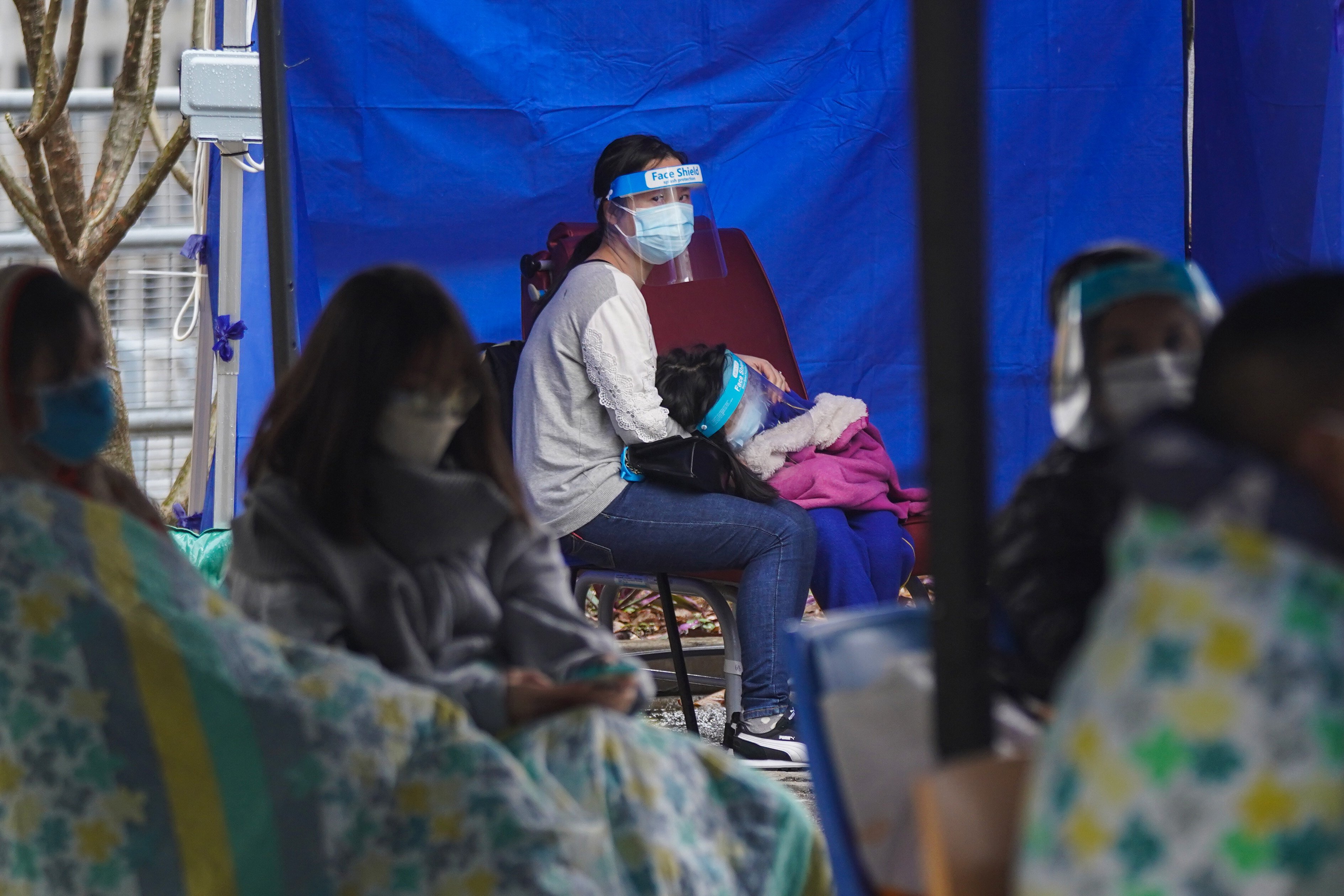 Patients wait in a temporary holding area outside Caritas Medical Centre in Cheung Sha Wan on February 17. Photo: Sam Tsang