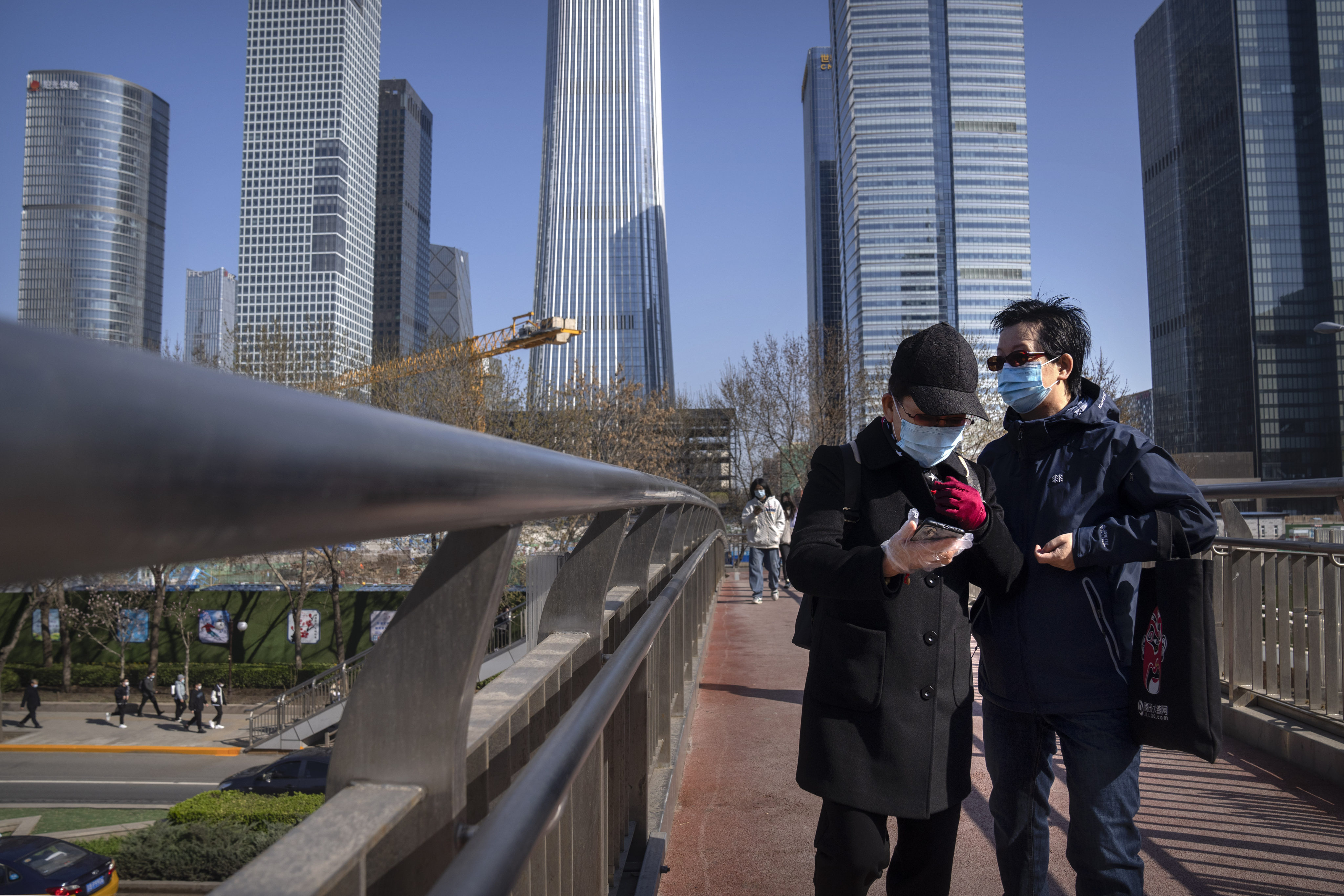 Commuters wearing face masks. Photo: AP