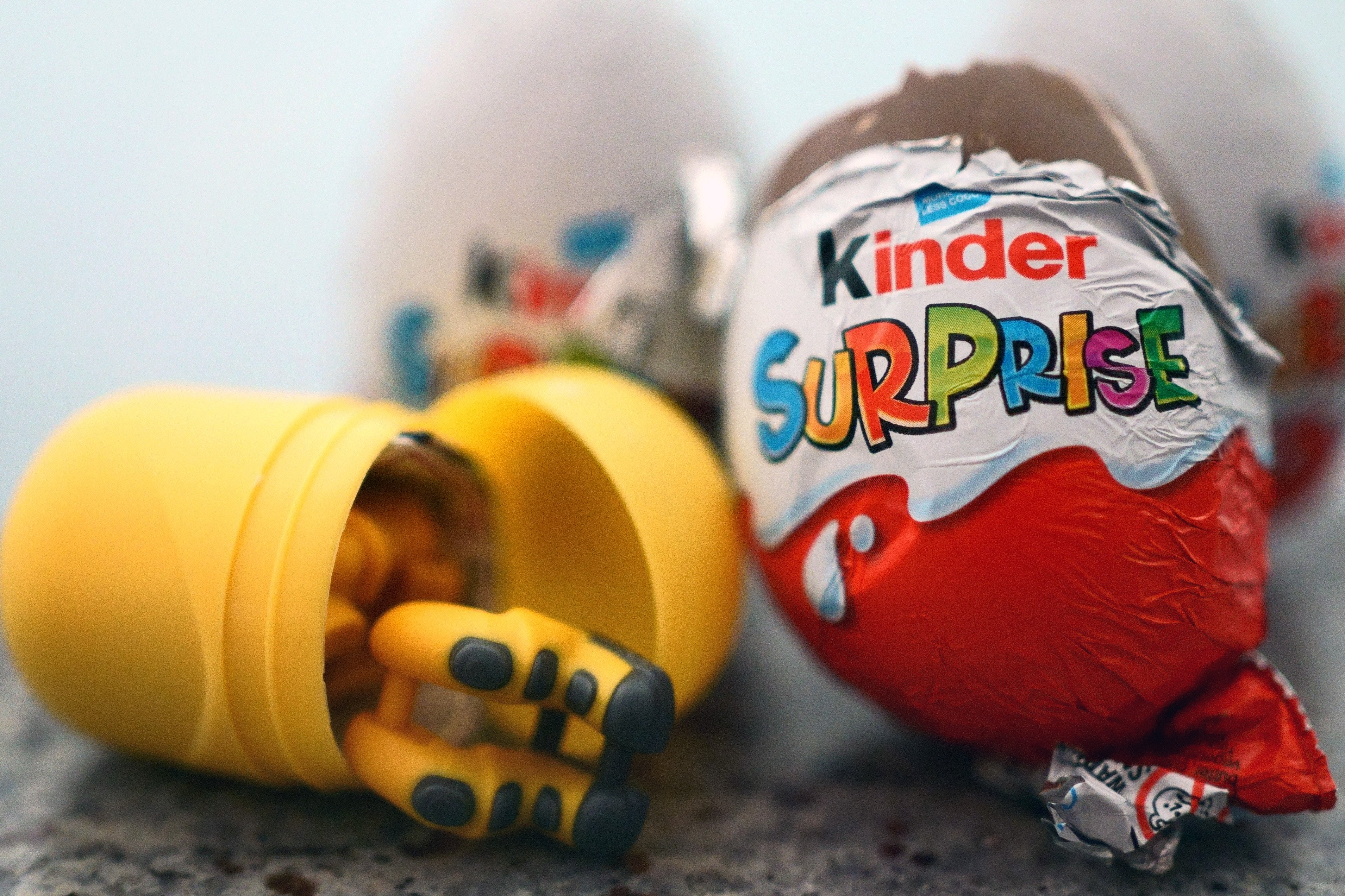 A toy lies next to a British variant of a Kinder Surprise egg. Photo: Victoria Jones/PA Wire/dpa