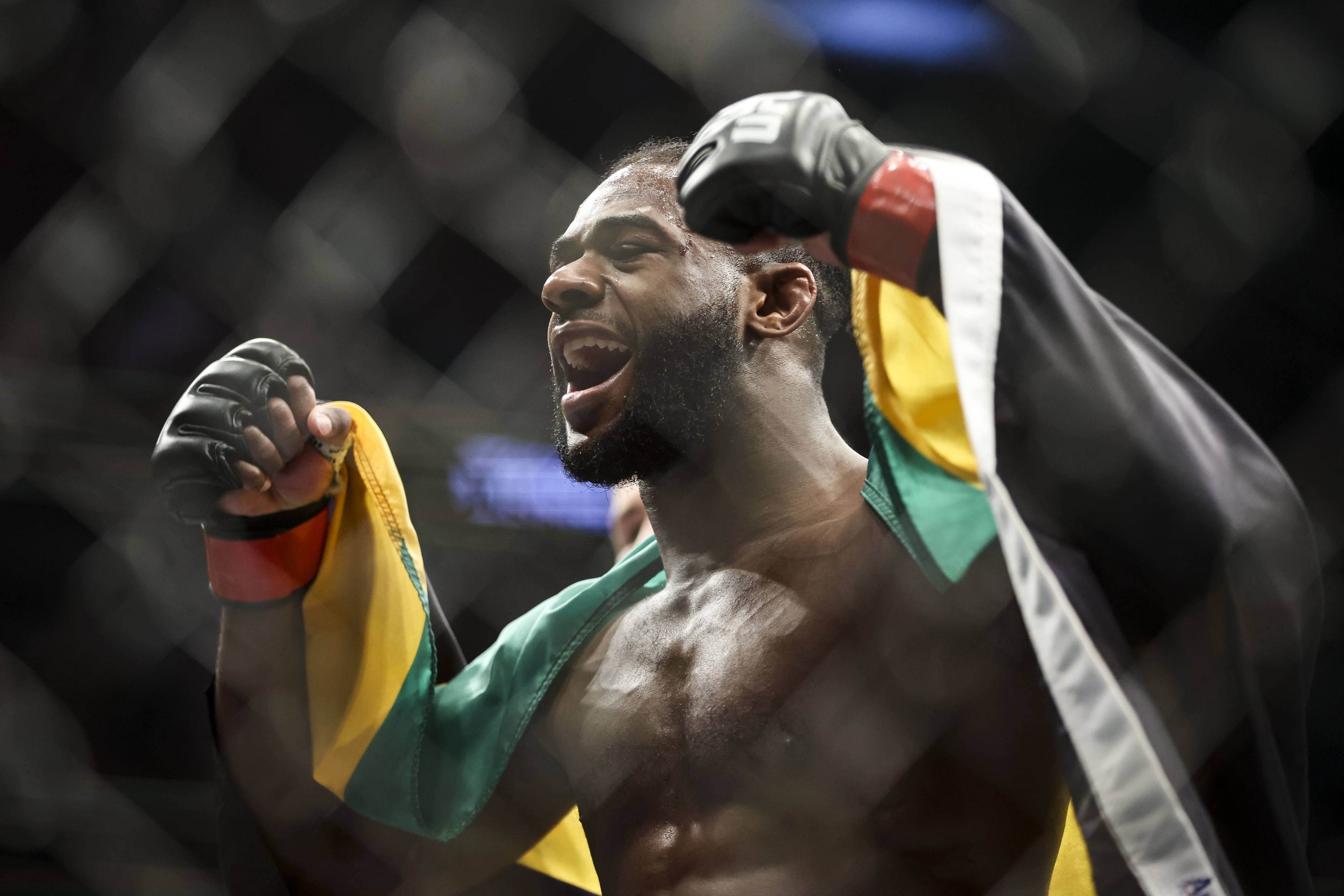 Aljamain Sterling celebrates after beating Petr Yan by decision at UFC 273 in Jacksonville, Florida. Photo: James Gilbert/Getty Images/AFP