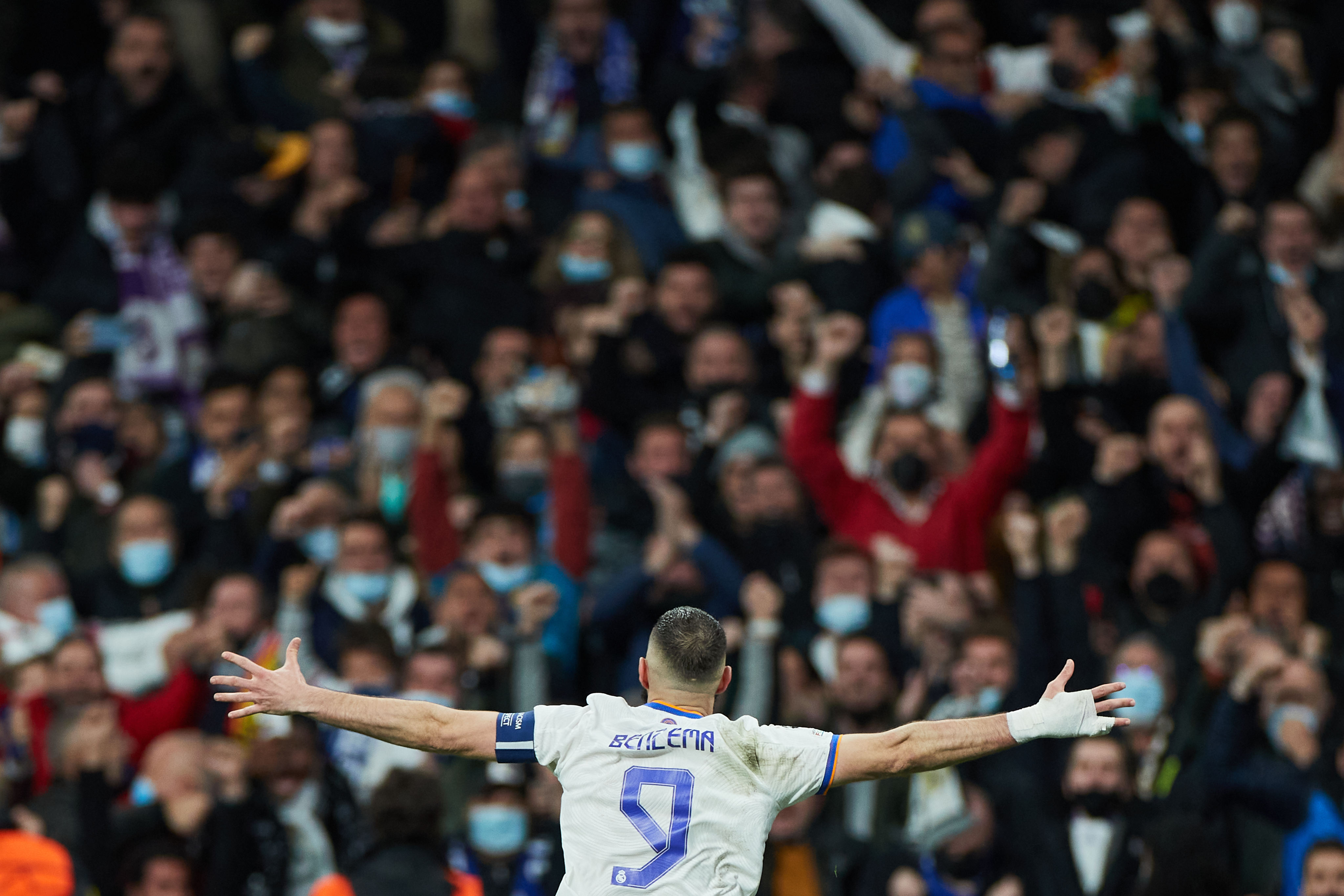 Karim Benzema of Real Madrid celebrates his extra-time goal against Chelsea. Photo: Xinhua/Meng Dingbo