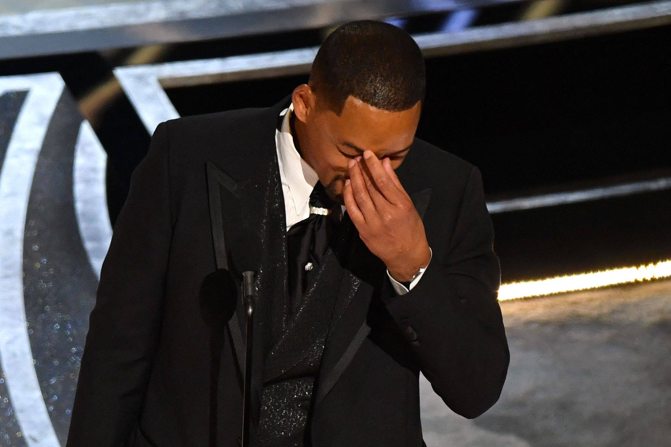 Will Smith accepts the award for best actor in a leading role for King Richard onstage during the 94th Oscars at the Dolby Theatre in Hollywood, California, on March 27. Photo: AFP
