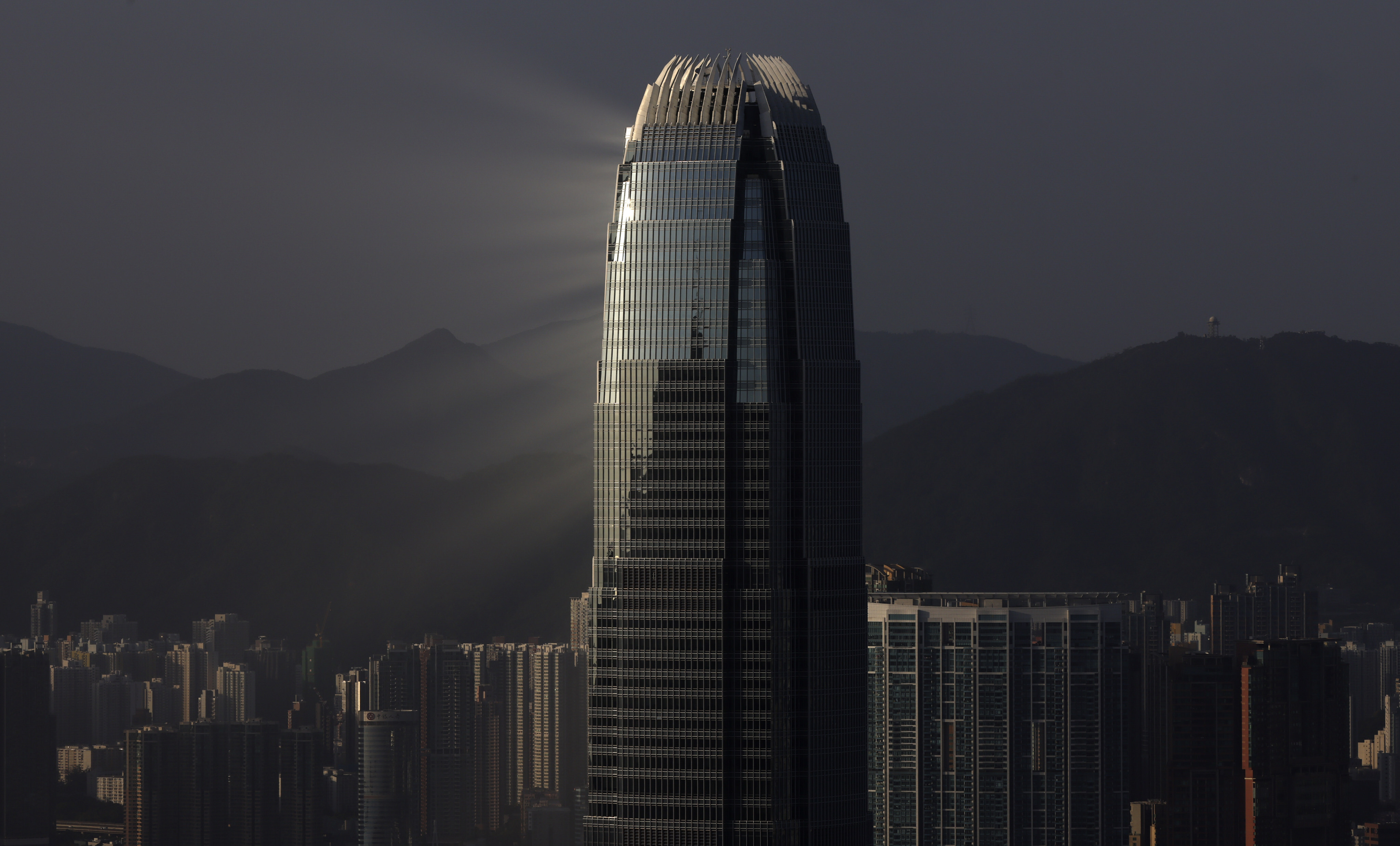 Light rays reflect off the International Finance Centre in Central on October 6, 2021. Hong Kong’s position as the Asia-Pacific’s leading financial centre will continue thanks to the support of the central government. Photo: Nora Tam