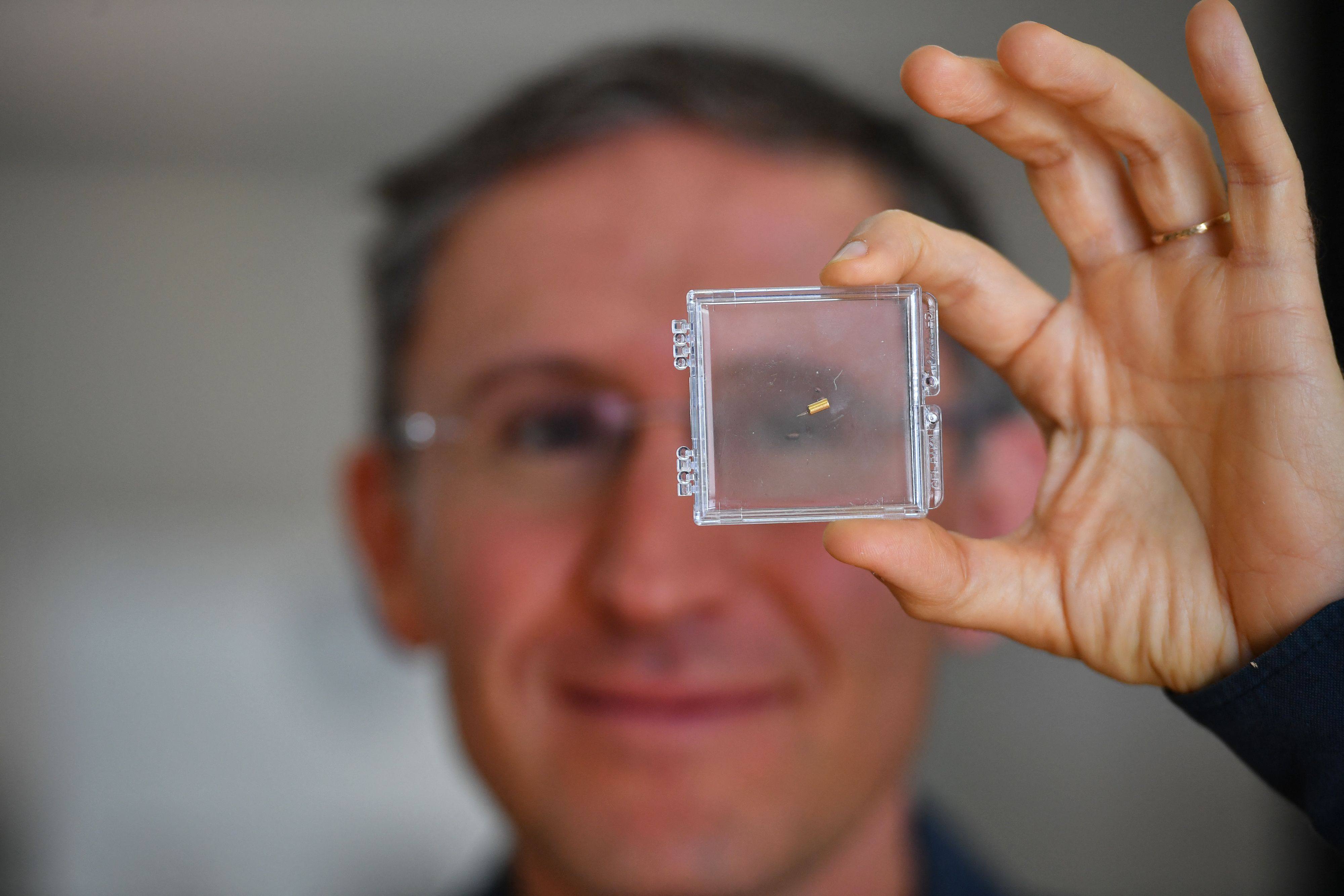 Bionaut Labs CEO and founder Michael Shpigelmacher displays the tiny remote-controlled medical micro-robot his company is developing in Los Angeles in March. Photo: AFP